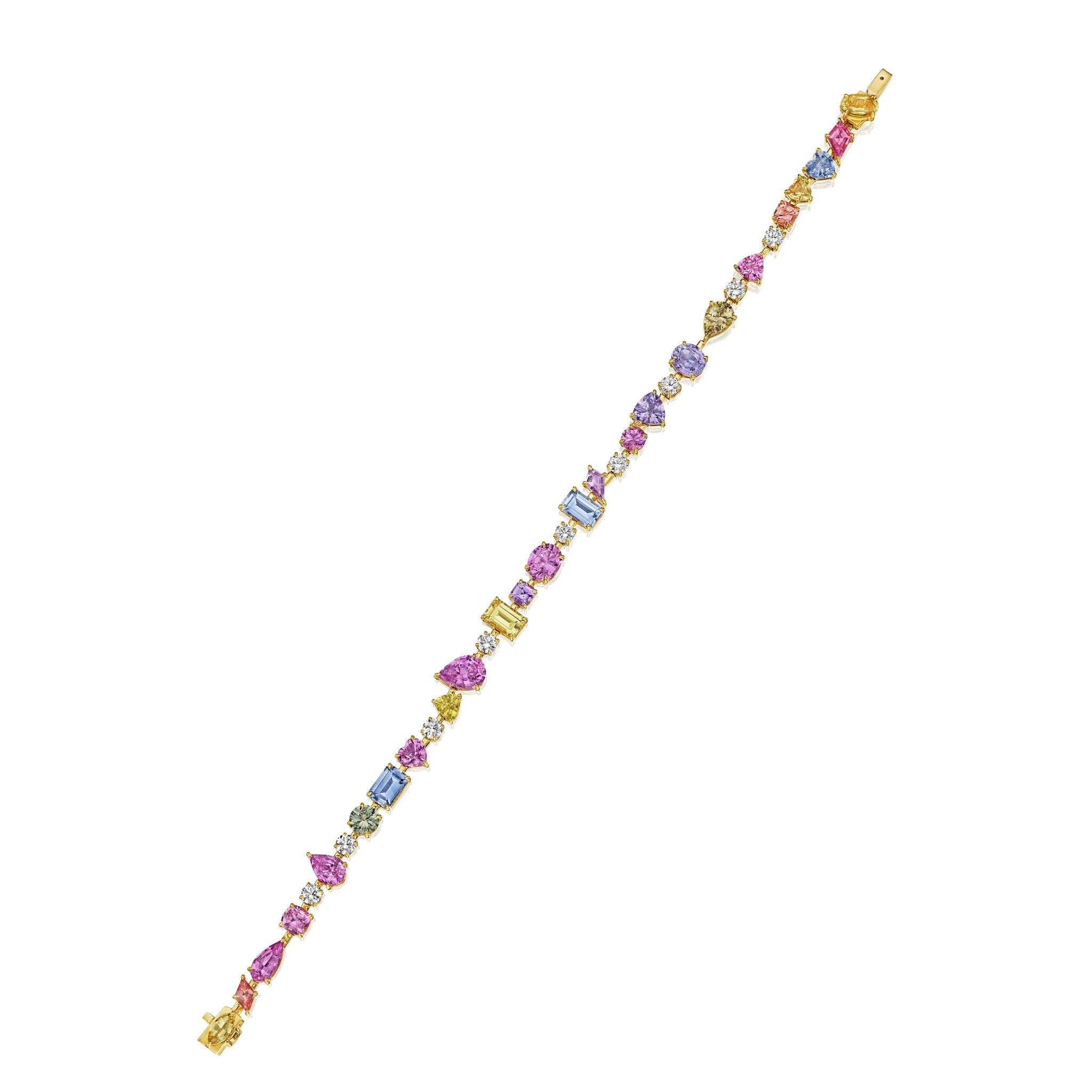The Chroma Kaleidoscope Mixed Shape Sapphire Tennis Bracelet in Yellow Gold dazzles with vibrant pink, blue, and clear sapphires in various shapes, elegantly spaced along an 18K gold band.