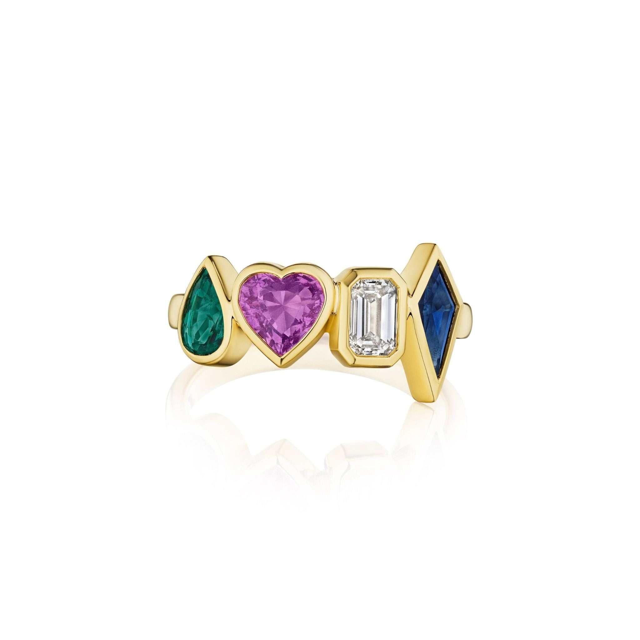 The Chroma Heart Beats Bezel Set Cluster Ring in 18K yellow gold features a green emerald teardrop, pink heart, emerald-cut diamond, and blue marquise sapphire—four stunning gems set in a row.