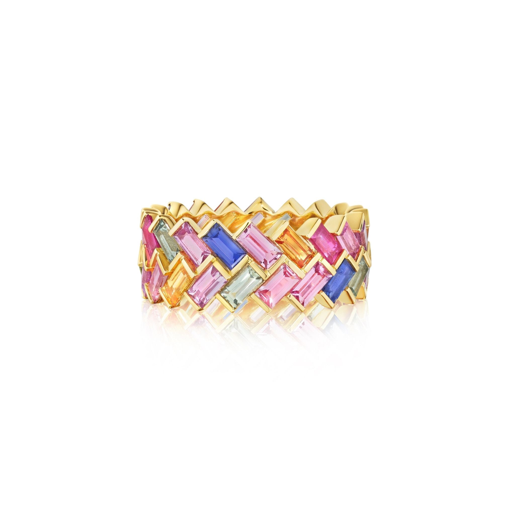 The Chroma Chevron Bezel Set Ring is crafted in 18K yellow gold and features a woven zigzag design with glossy finish, set with multicolor baguette sapphires—pink, blue, yellow, orange, and light green—in alternating colors.