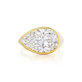 East-West Bezel Set Pear Shape Diamond Ring in Yellow Gold