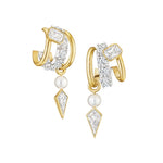 Triple Huggies in 18K yellow gold featuring emerald cut, round, and kite-shaped diamonds for a modern, asymmetrical look. The sparkling diamonds elevate these unique hoop earrings.