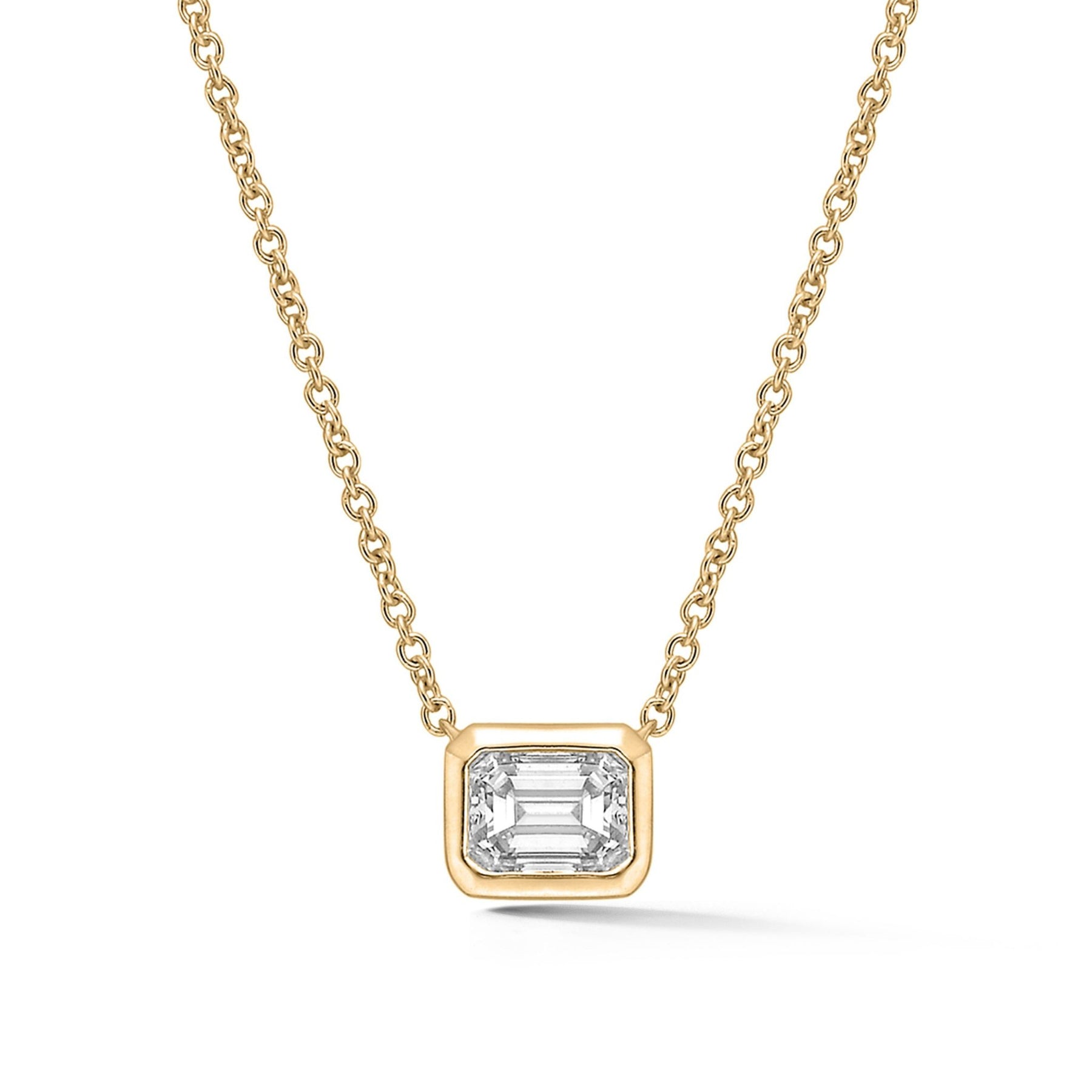 Bezel Set Emerald Cut Diamond Solitaire Pendant in Yellow Gold