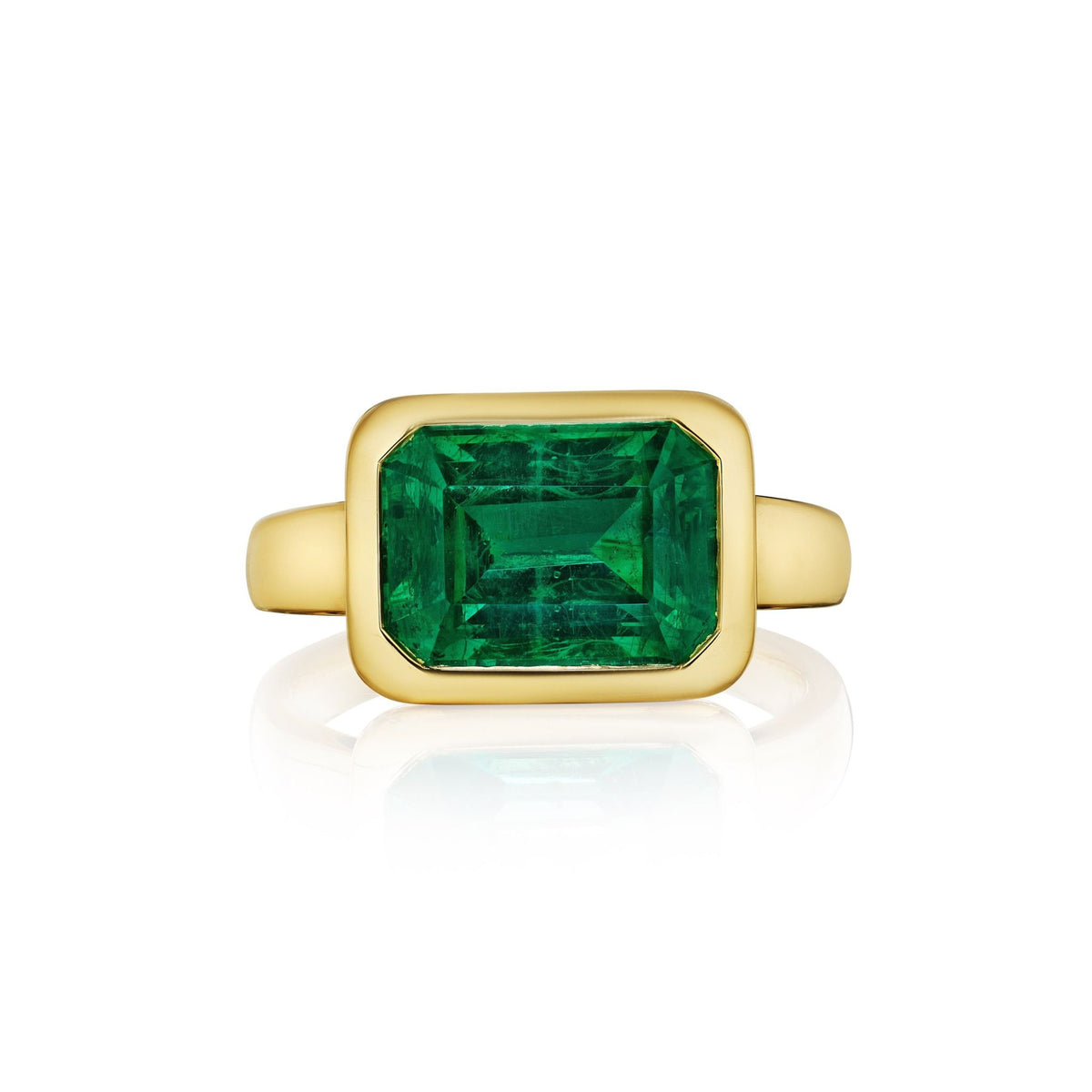 East-West Bezel Set Emerald Cut Emerald Engagement Ring in Yellow Gold