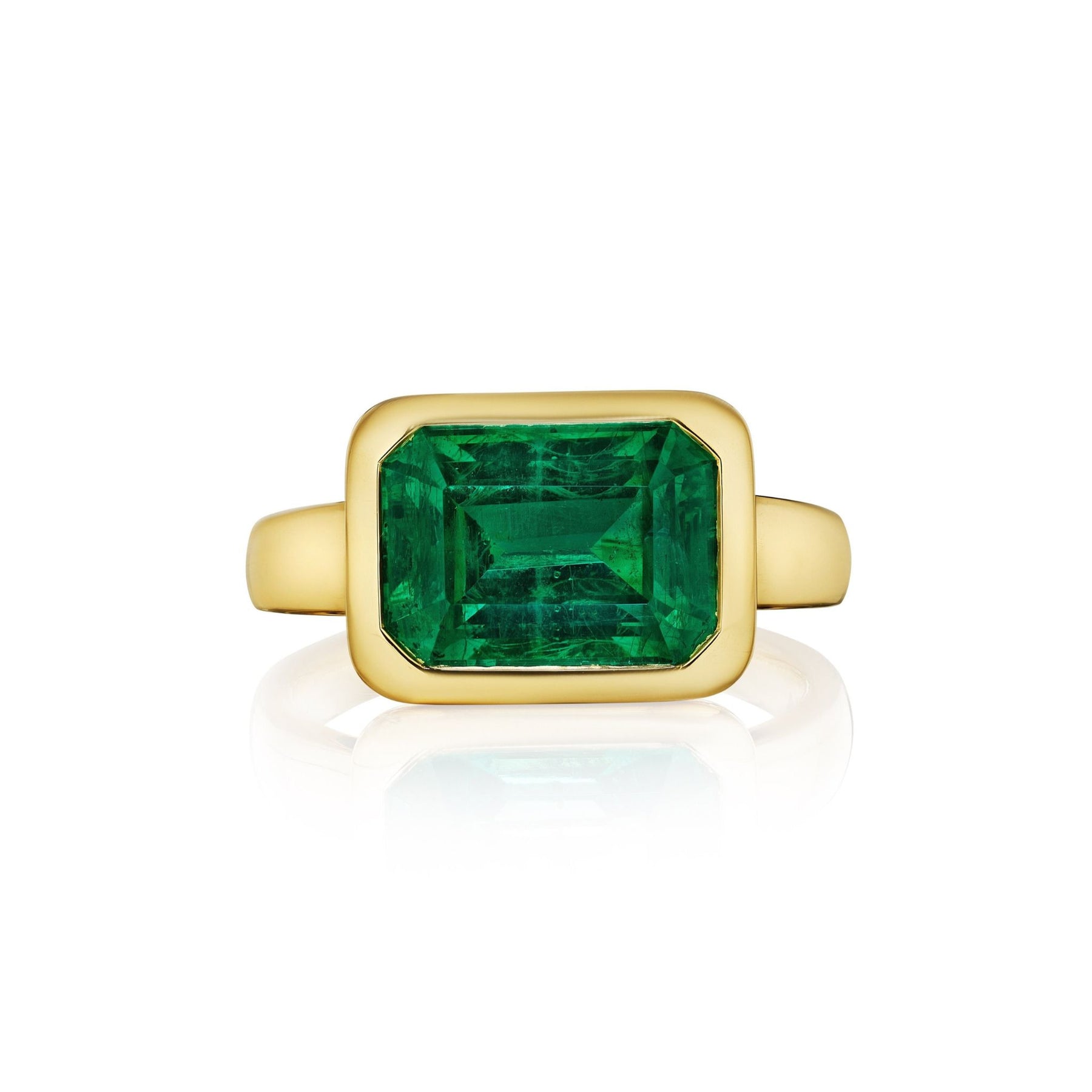 East-West Bezel Set Emerald Cut Emerald Engagement Ring in Yellow Gold