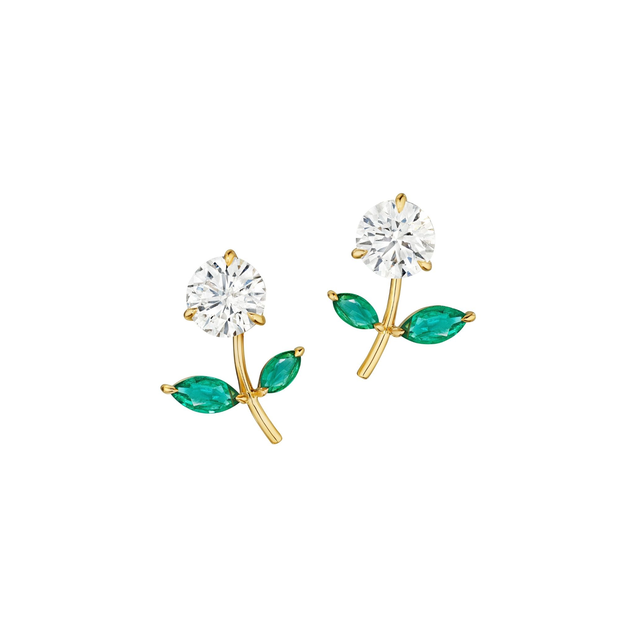 The Flower Ear Jackets with Marquise Emerald Petals in Yellow Gold feature a round white gemstone bloom and two marquise emerald petals on each earring for an elegant, nature-inspired look.