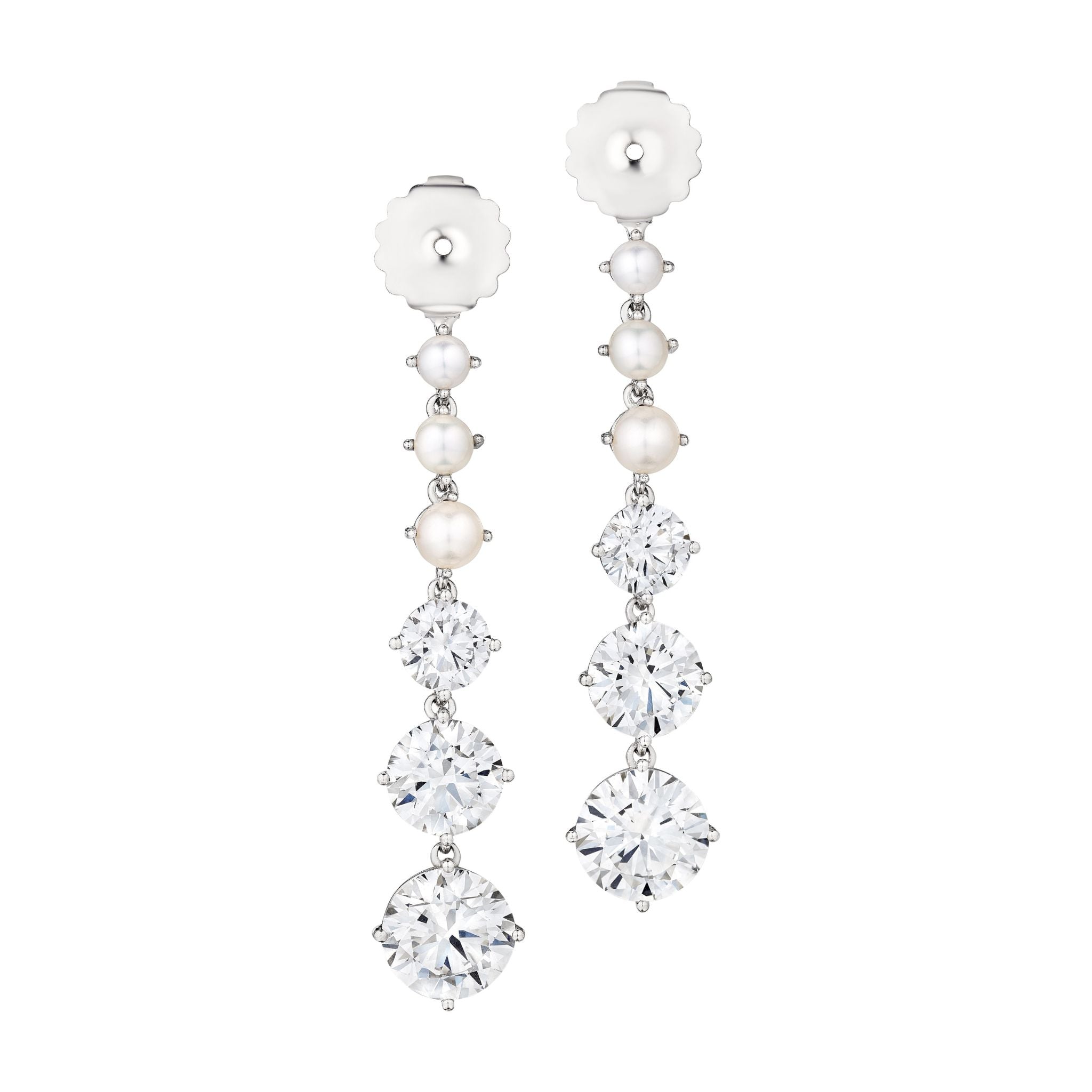 The Bespoke Graduated Drop Ear Jackets in white gold feature pearls and round brilliant diamonds—ideal for those who love customizable jewelry.