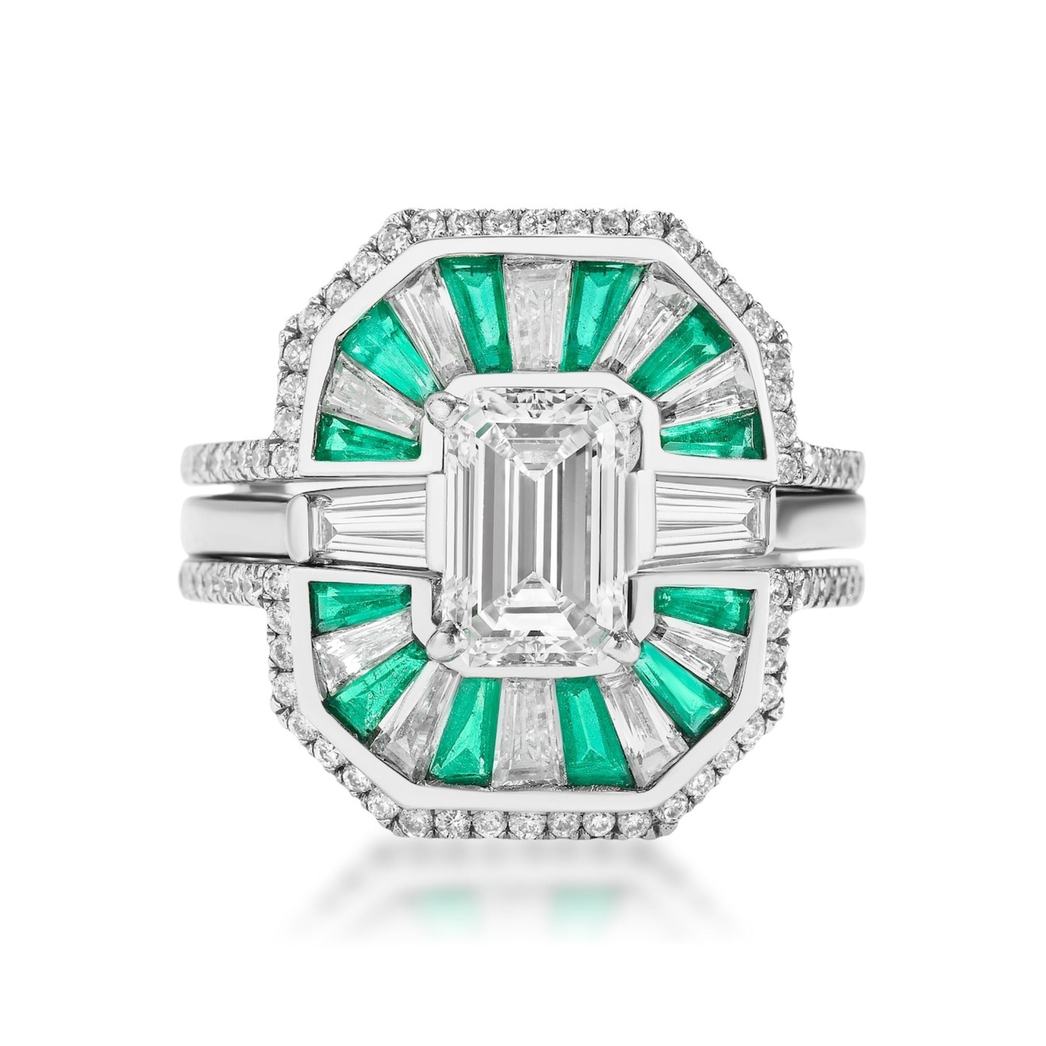 The Bespoke Mosaic Tapered Baguette Emerald and Diamond Ring Jacket in White Gold features a central emerald-cut diamond, framed by alternating baguette emeralds and white diamonds in a geometric halo, with pavé diamonds along the band.