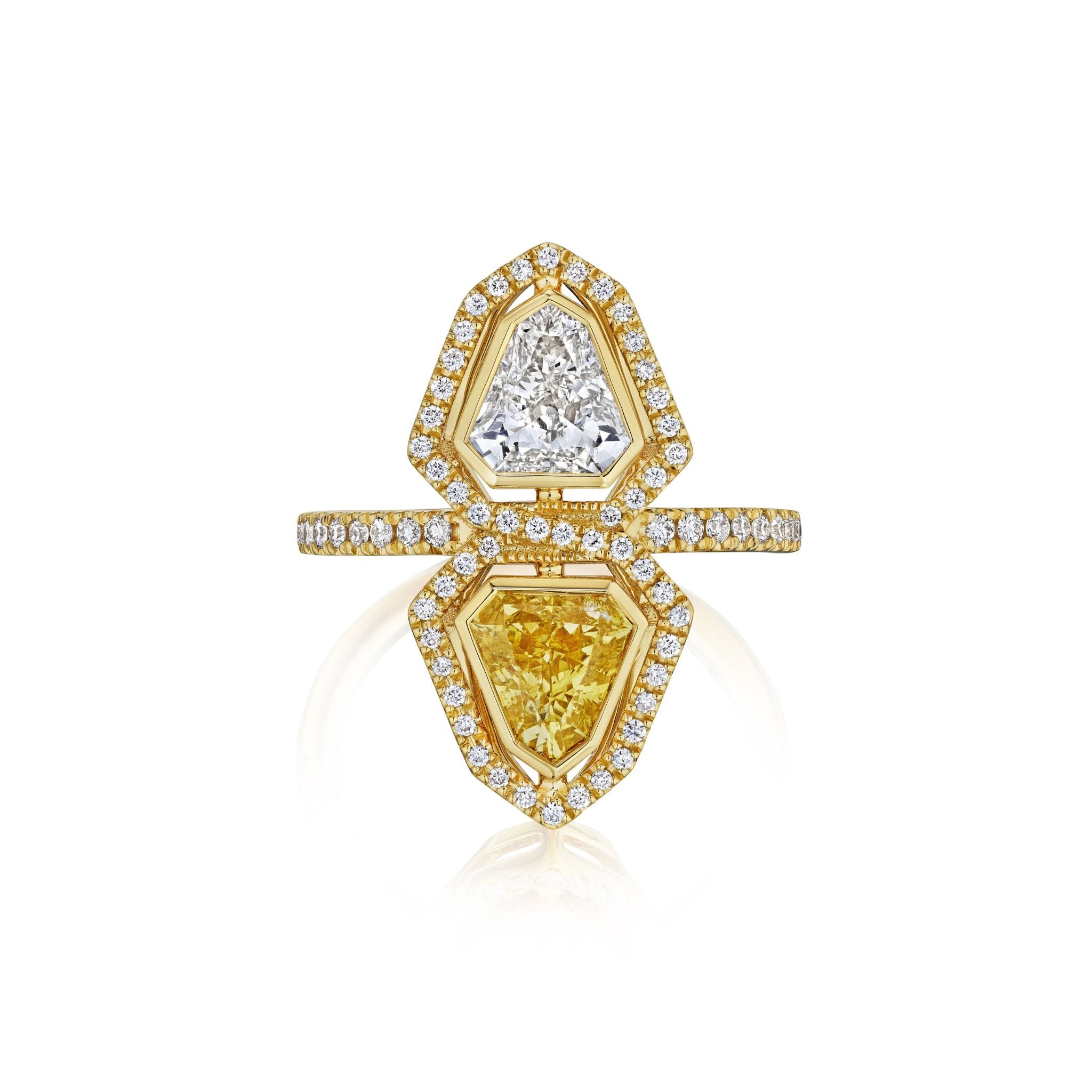 The Yellow Diamond and White Diamond Double Shield Ring with Halo in Yellow Gold features two geometric diamonds—one white, one yellow—each surrounded by a halo of smaller diamonds and accented with additional white diamonds on the band.