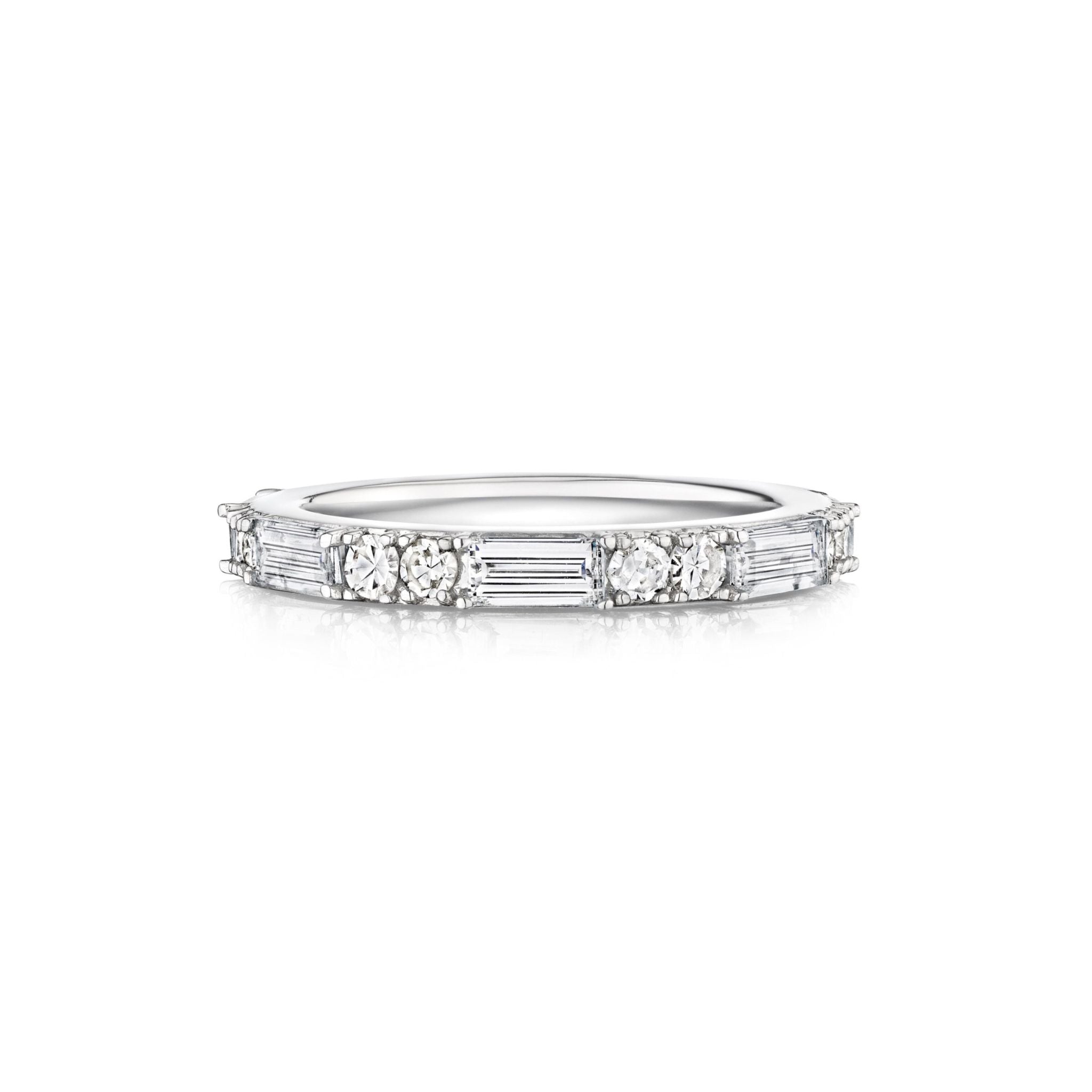 The East-West Set Baguette and Round Diamond Eternity Band in 18K white gold showcases alternating round and baguette diamonds in a continuous band, displayed side-on against a white background.