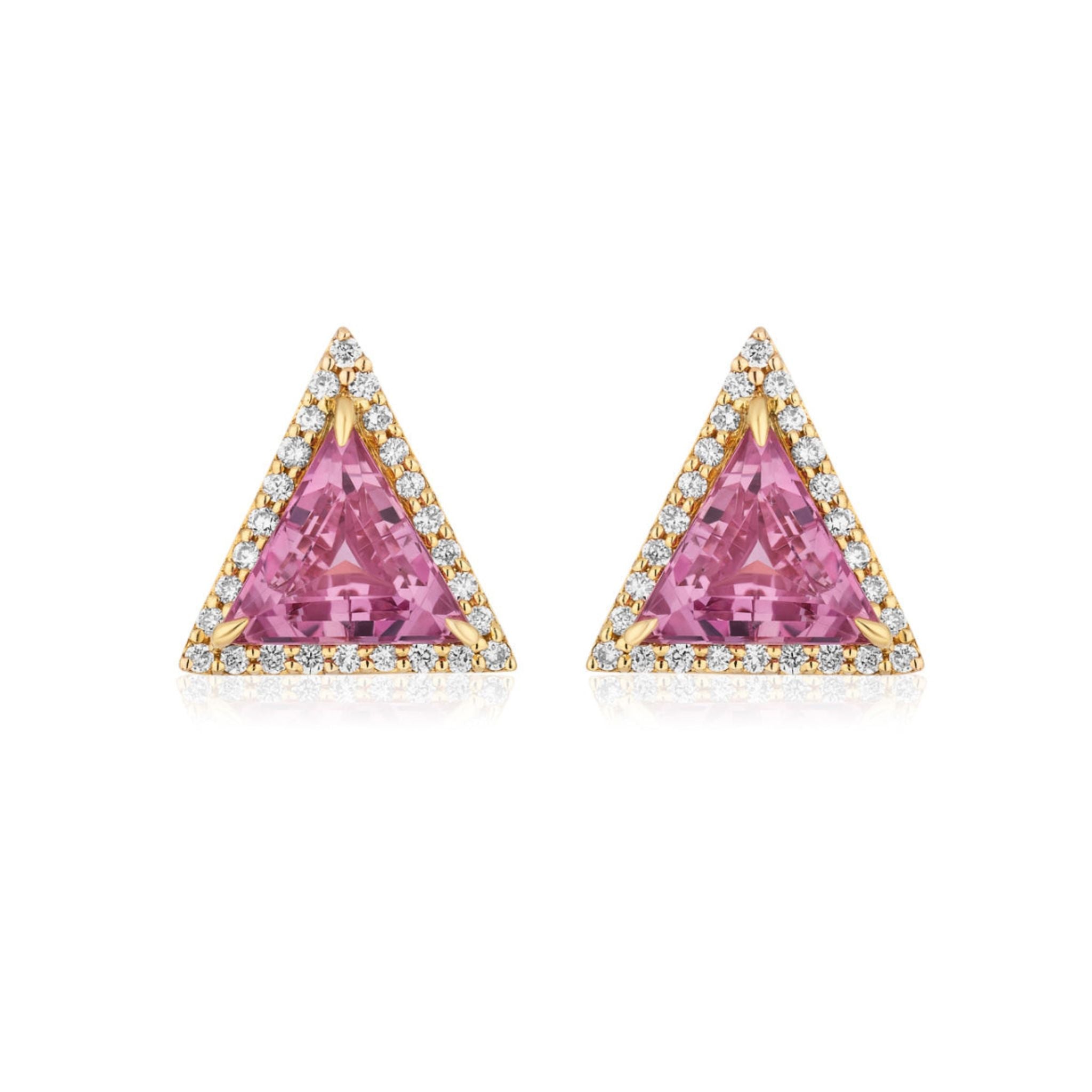 The Triangle Cut Pink Sapphire Studs with Pavé in Yellow Gold feature hot pink sapphires at the center, each accented by a pavé border of sparkling white diamonds.