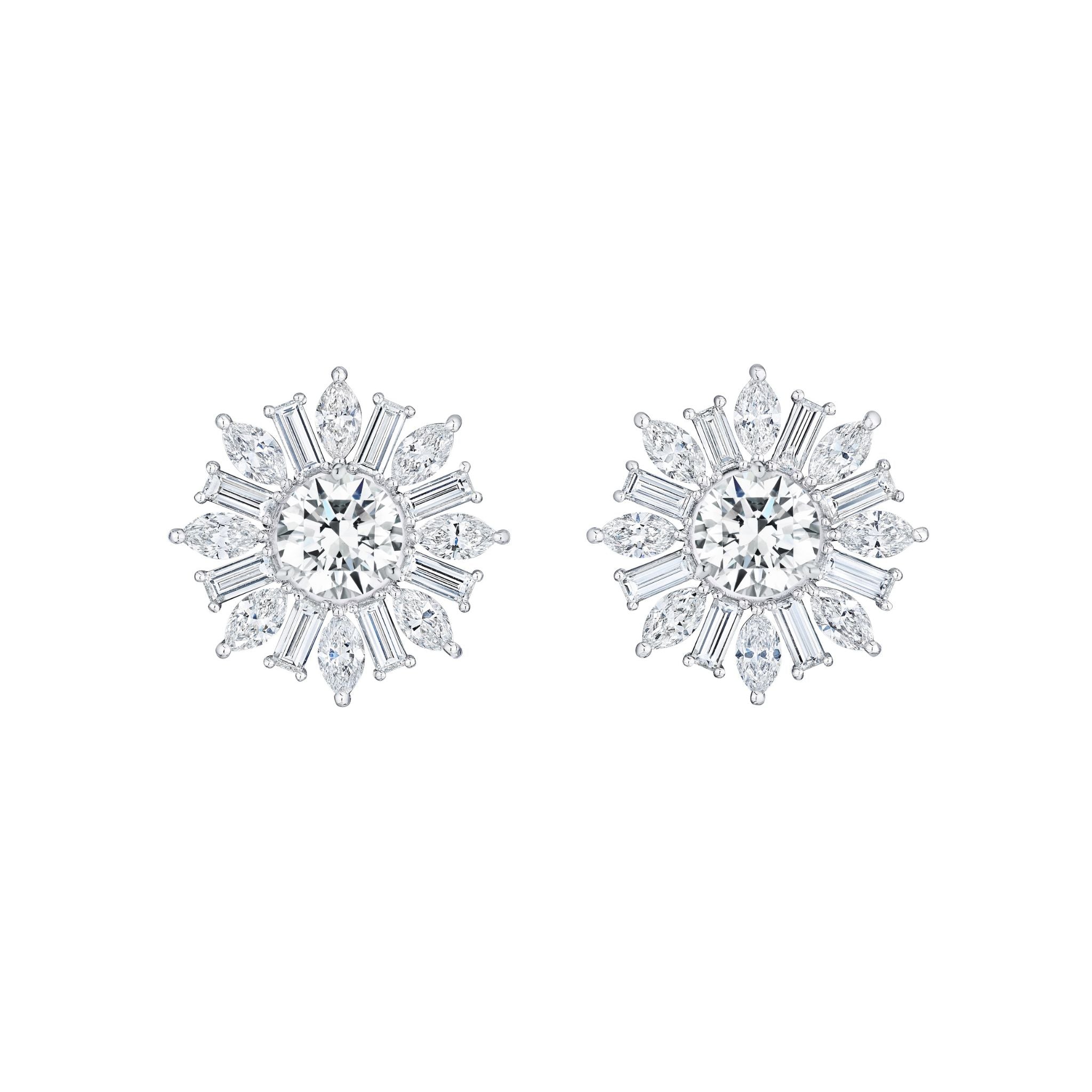 The Snowflake Marquise and Baguette Diamond Ear Jackets in white gold feature a dazzling snowflake design with marquise and baguette diamonds, set in luxurious 18k white gold.