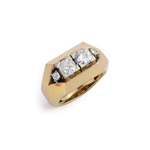 Introducing the Mauboussin Gold and Diamond Ring, circa 1940—an eye-catching piece with a geometric design. Crafted in 18K white gold, this vintage ring showcases three prominent round diamonds and two smaller diamonds arranged in a rectangular pattern on top.