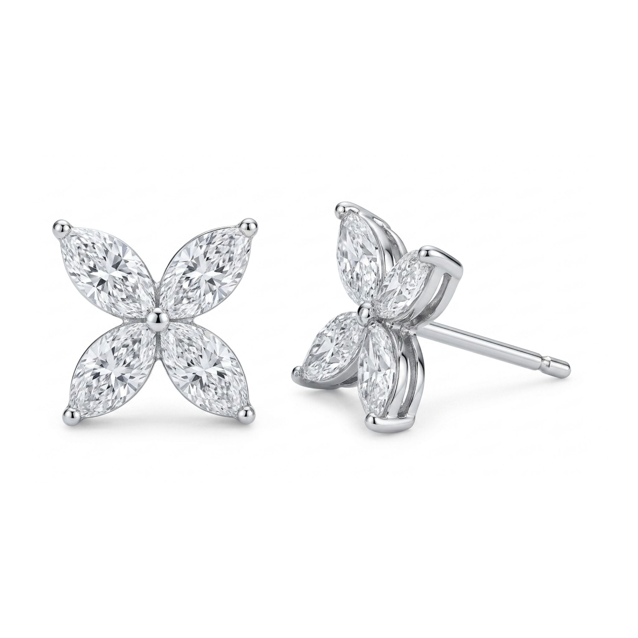The Marquise Flower Diamond Studs in White Gold feature four-petal blooms with G-H color marquise diamonds set in 18k white gold, finished with a polished shine and secure push-back posts.