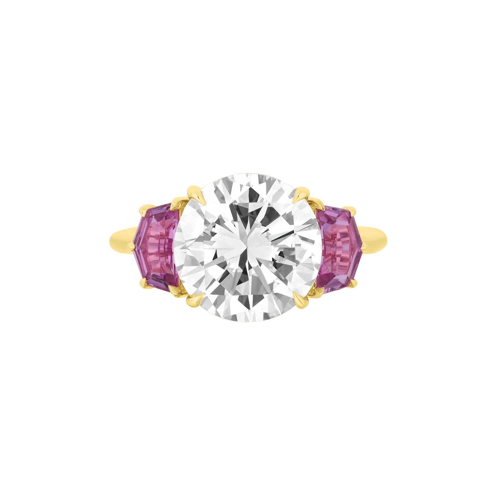 A Round Brilliant Diamond Engagement Ring featuring a central diamond and accented by epaulette pink sapphire side stones.