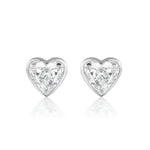 Bezel Set Diamond Heart Studs featuring G color stones in white metal, showcased on a plain white background.