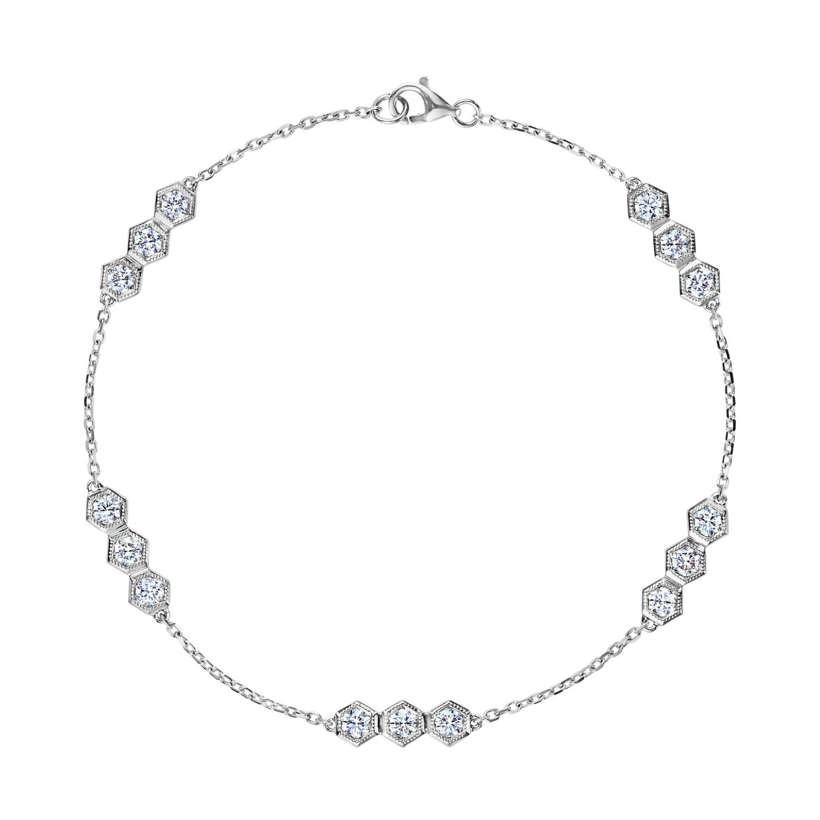 The Serpentine Station Bracelet features trios of sparkling round brilliant diamonds set in hexagonal clusters along a delicate silver chain, secured with a lobster clasp.