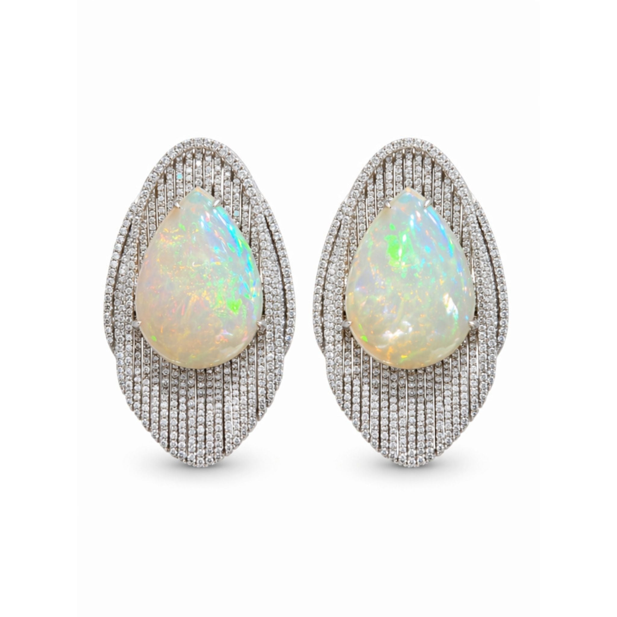 The Pair of Opal and Diamond Earrings showcases large oval cabochon opals encircled by rows of round diamonds, all set in an intricate, elongated platinum design.
