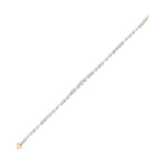 The Heart Shape Centered Mixed Shape Prong Set Diamond Tennis Bracelet showcases a row of sparkling diamonds in various shapes, centered with a heart design, set in gold and displayed on a white background.