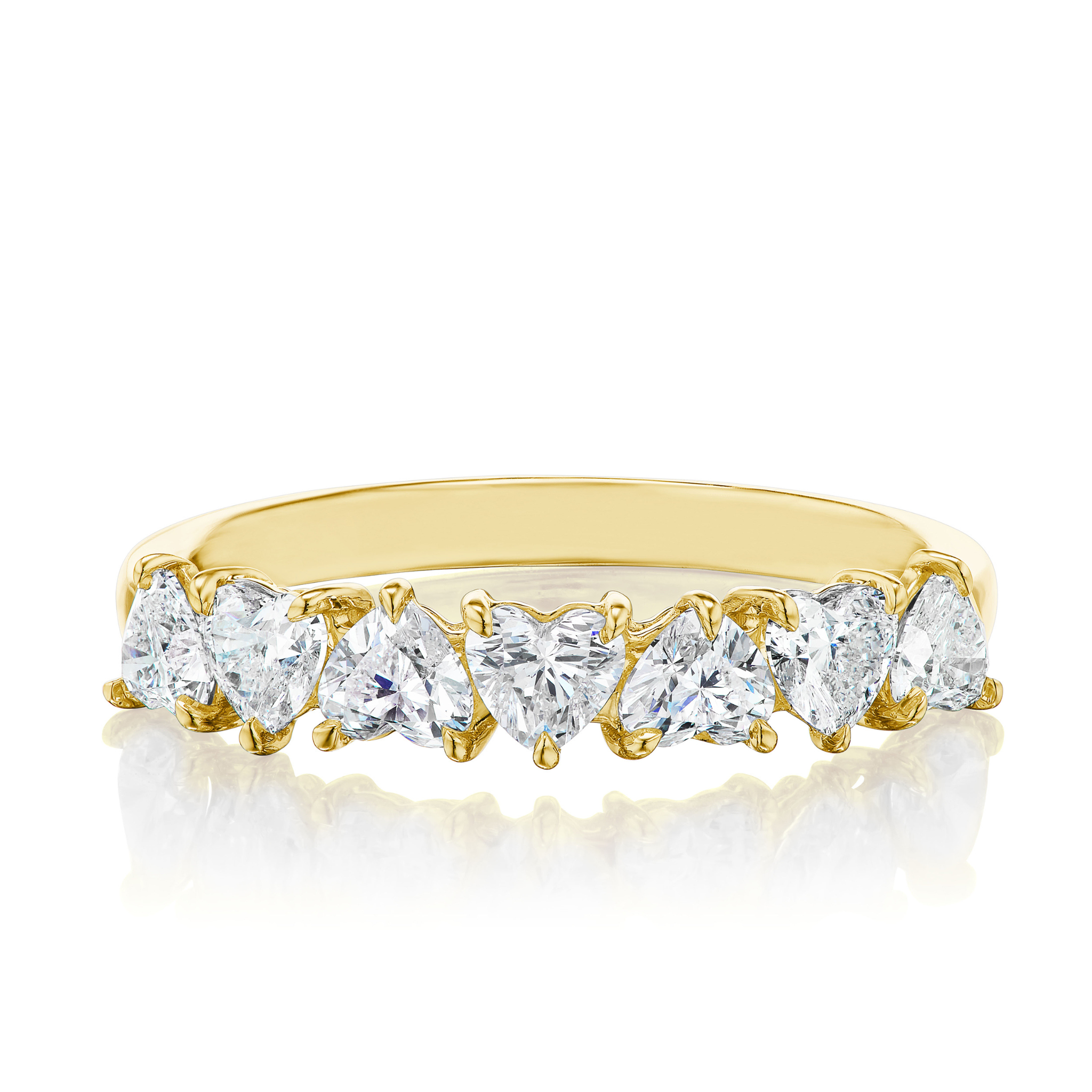 The Up and Down Heart Diamond Half Eternity Band showcases seven heart-shaped diamonds set in a row, displayed on a white background with a subtle reflection underneath.