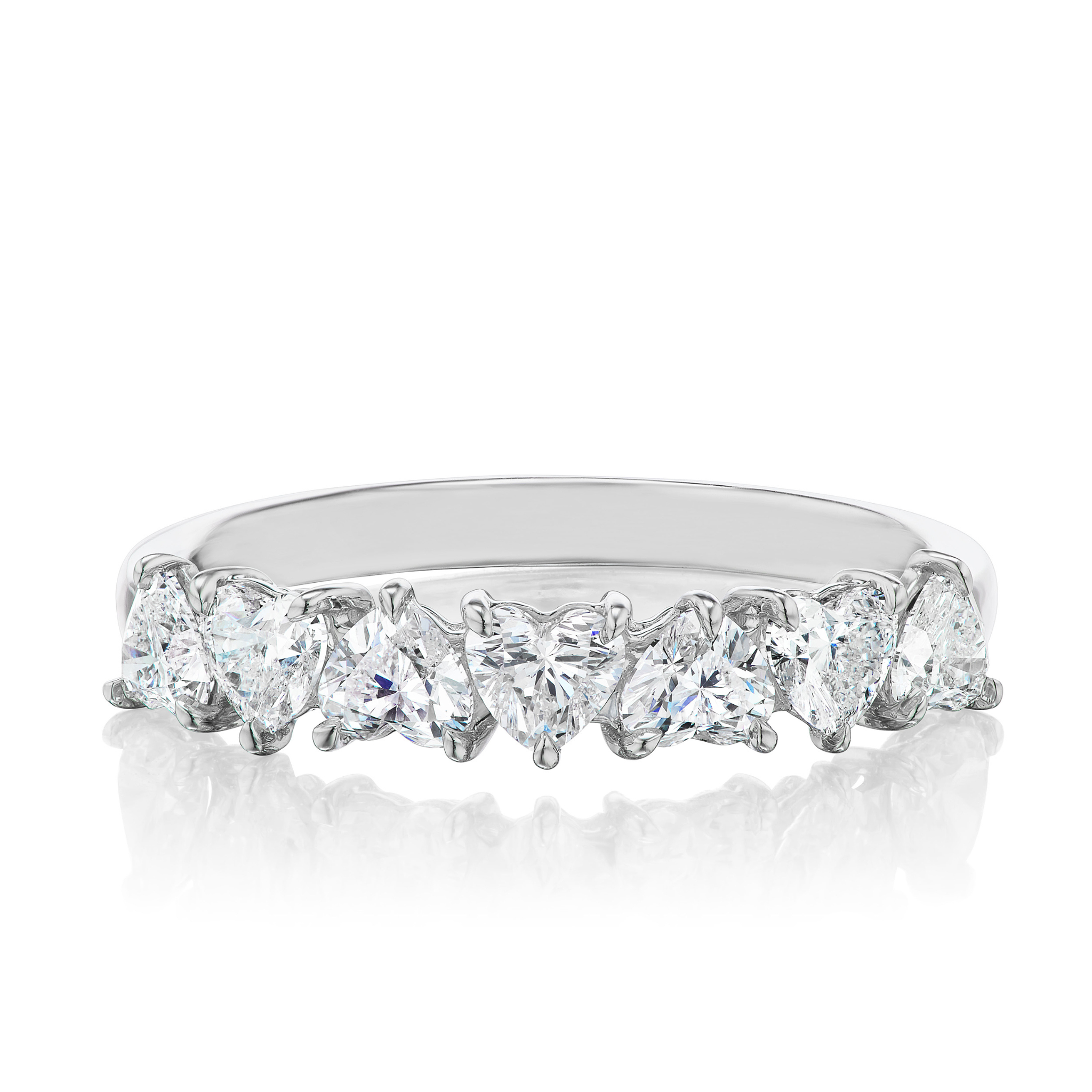 The Up and Down Heart Diamond Half Eternity Band features seven sparkling heart-shaped diamonds in prong settings on a white gold band—ideal for special occasions or as an elegant bridal ring.