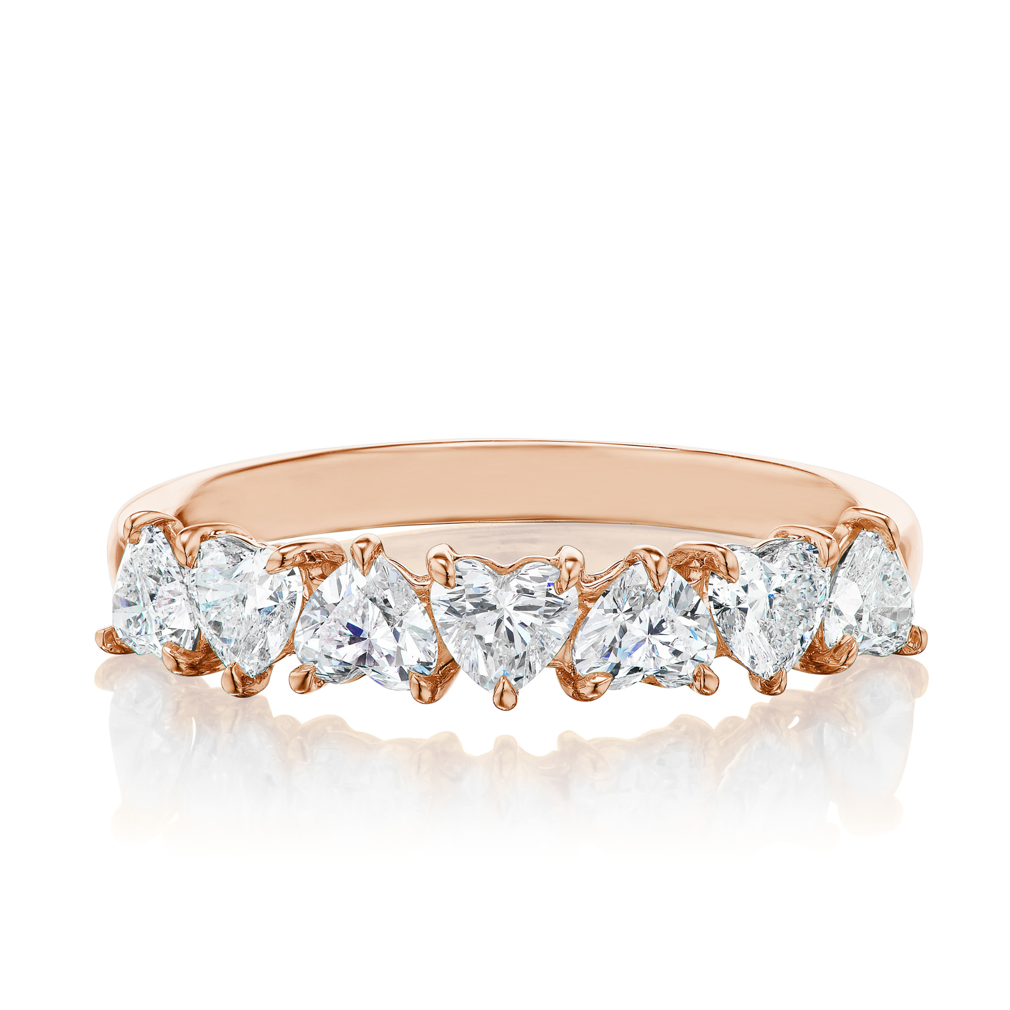 The Up and Down Heart Diamond Half Eternity Band in rose gold showcases seven side-by-side heart-shaped diamonds on a white background—a romantic bridal ring choice.
