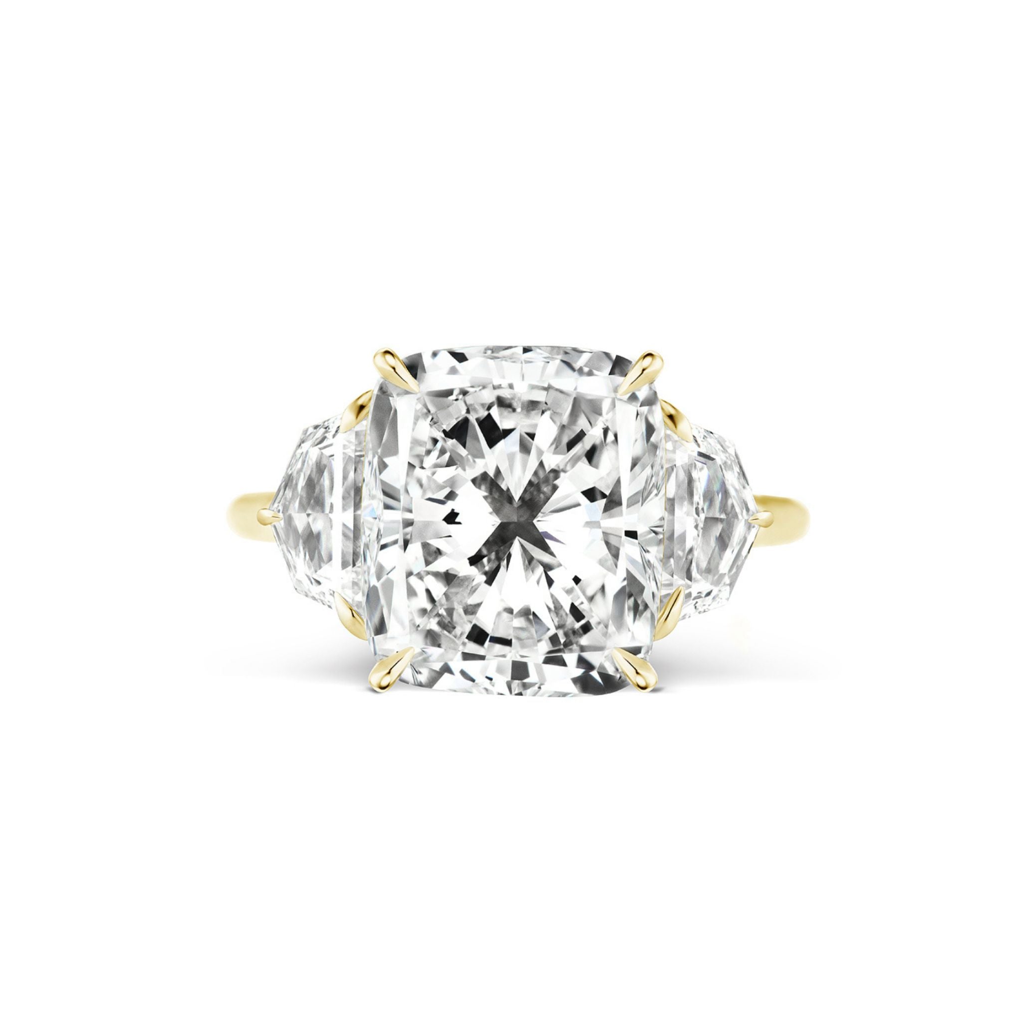 A Cushion Cut Diamond Engagement Ring with Epaulette Side Stones features a large rectangular cushion-cut diamond at its center, accented on either side by two epaulette-shaped diamonds, all set in yellow gold prongs.