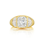 Introducing the Burnish Set Cushion Diamond Engagement Ring with Half Moon Side Stones, showcasing a striking cushion-cut diamond at its center, gracefully complemented by two sparkling half moon side stones and elegantly set on a polished yellow gold band.