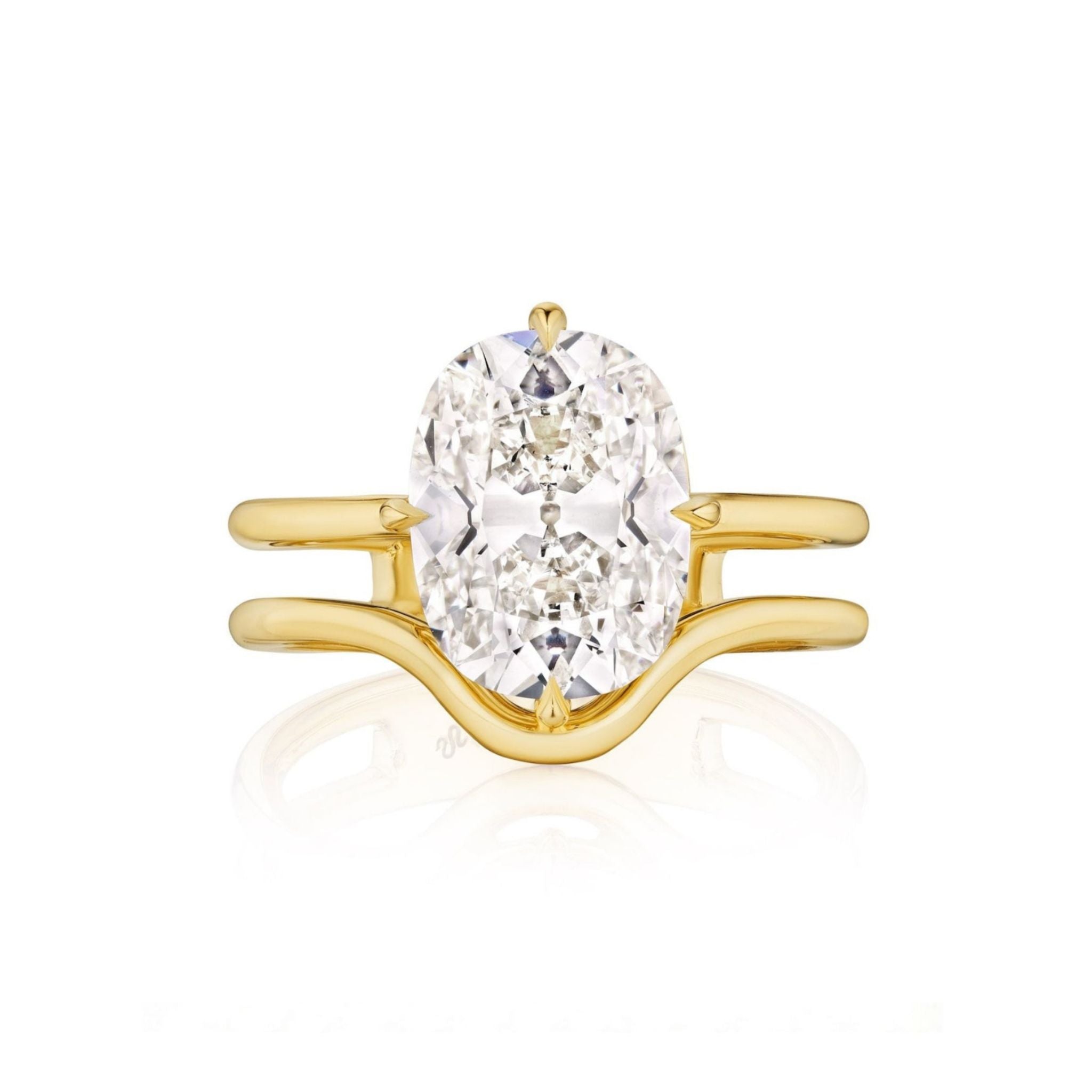 A Double Band North-South Prong Set Cushion Cut Diamond Engagement Ring, expertly crafted in lustrous 18k yellow gold and featuring a striking cushion cut diamond at the center.