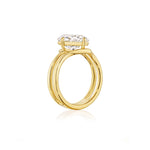 A side view of the Double Band North-South Prong Set Cushion Cut Diamond Engagement Ring in yellow gold, featuring an 18k gold band and a large cushion-cut diamond set in a unique north-south four-prong setting, displayed on a white background.