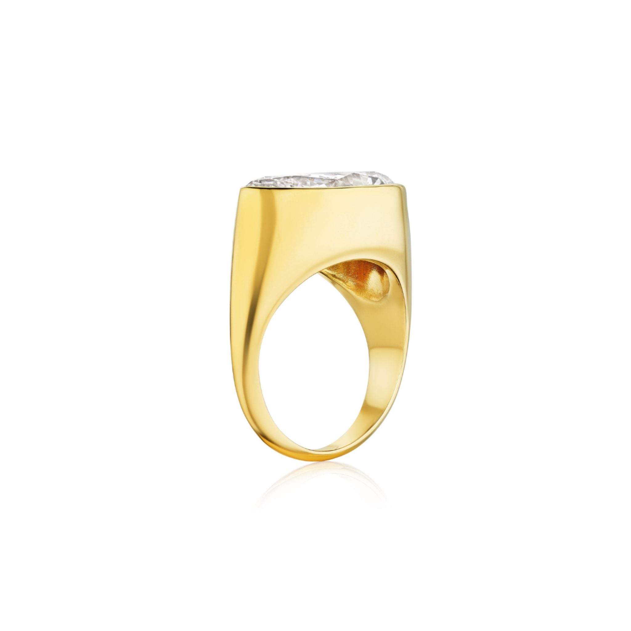 An East-West Bezel Set Pear Shape Diamond Ring in yellow gold is displayed from a side profile on a white background. The classic design emphasizes the elegant simplicity of the yellow gold setting and the unique pear-shaped diamond.