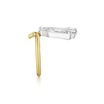 The Shield Diamond Perch Engagement Ring in Yellow Gold features a slender band and a large, clear oval diamond set in a silver prong setting, elegantly displayed on a white background. This custom engagement ring beautifully blends timeless sophistication with modern elegance.