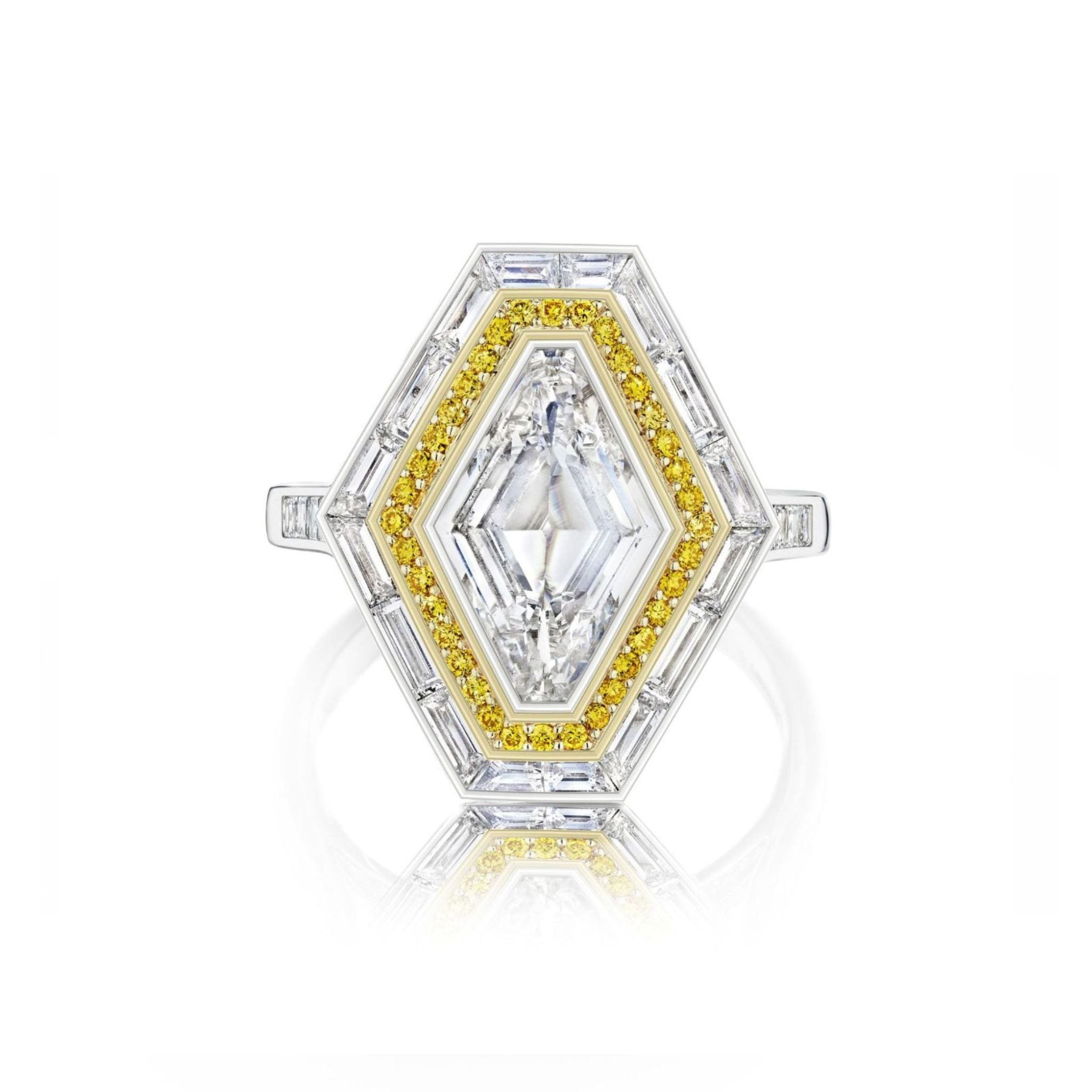 A revival engagement ring featuring a lozenge shape diamond at the center, encircled by a halo of yellow round diamonds and an outer channel-set white diamond border, all set in white gold.