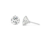 A pair of Classic Round Diamond Studs in a martini setting, featuring GIA Certified round brilliant diamonds set in 18k white gold, displayed from the front and side against a white background.