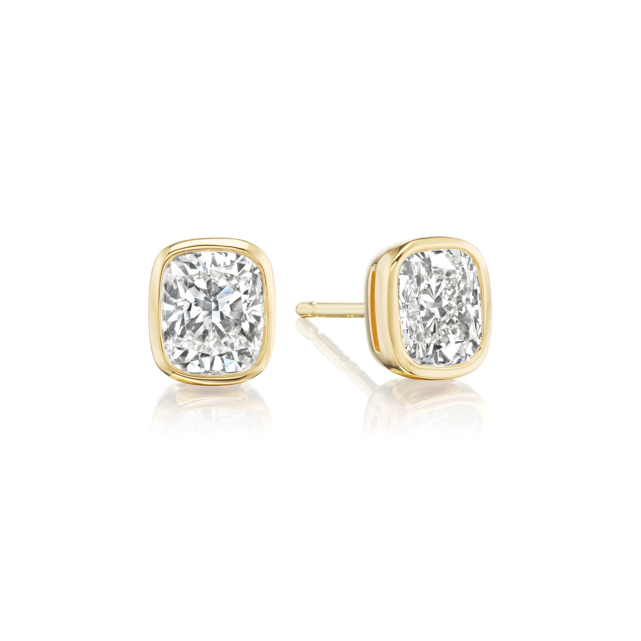 Bezel Set Cushion Cut Diamond Studs in Yellow Gold, featuring GIA certified stones set in 18k yellow gold bezels, displayed on a white background.