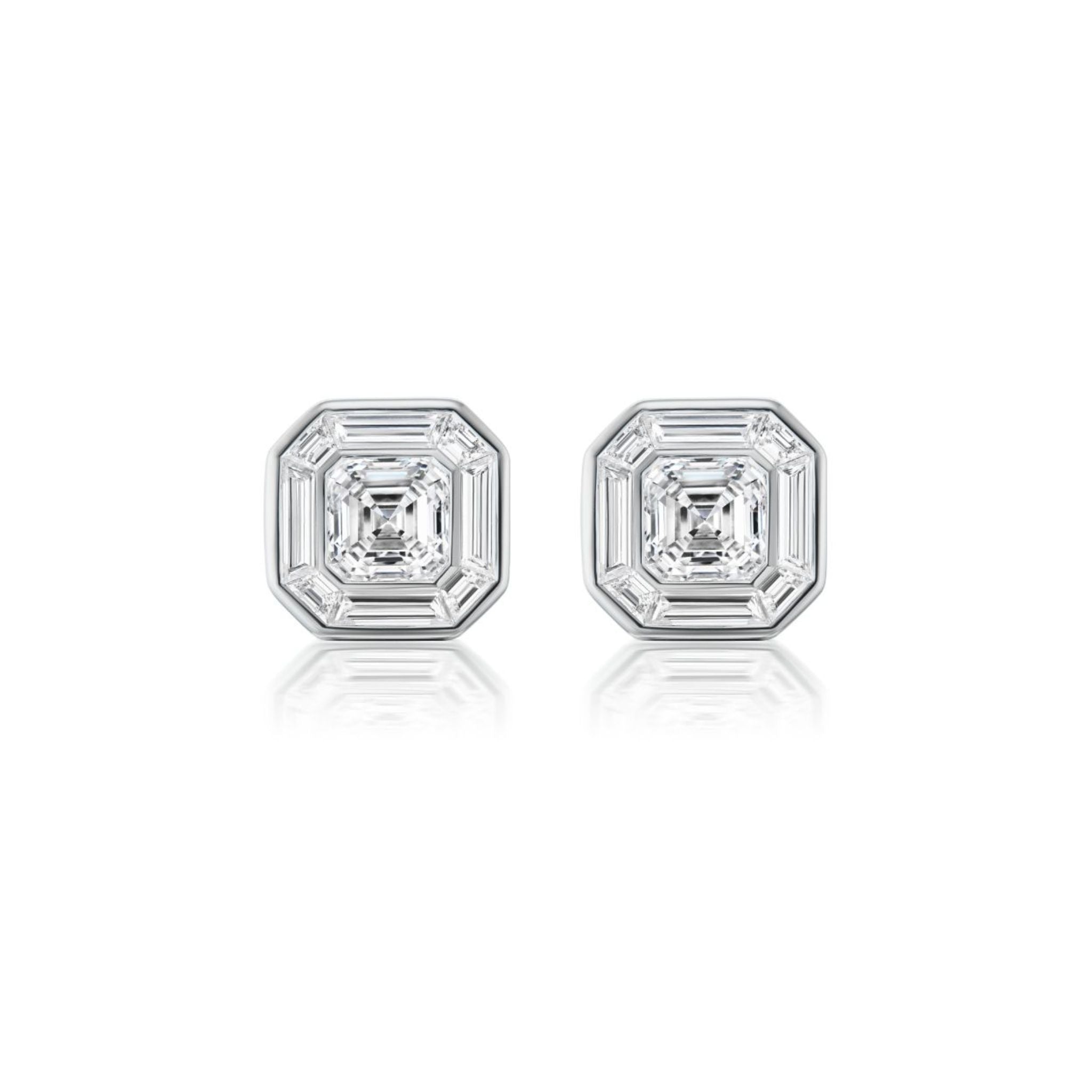 A pair of Mosaic Studs with Asscher Cut Diamonds in white gold, featuring an octagonal design with a central Asscher cut diamond surrounded by baguette-cut diamonds.