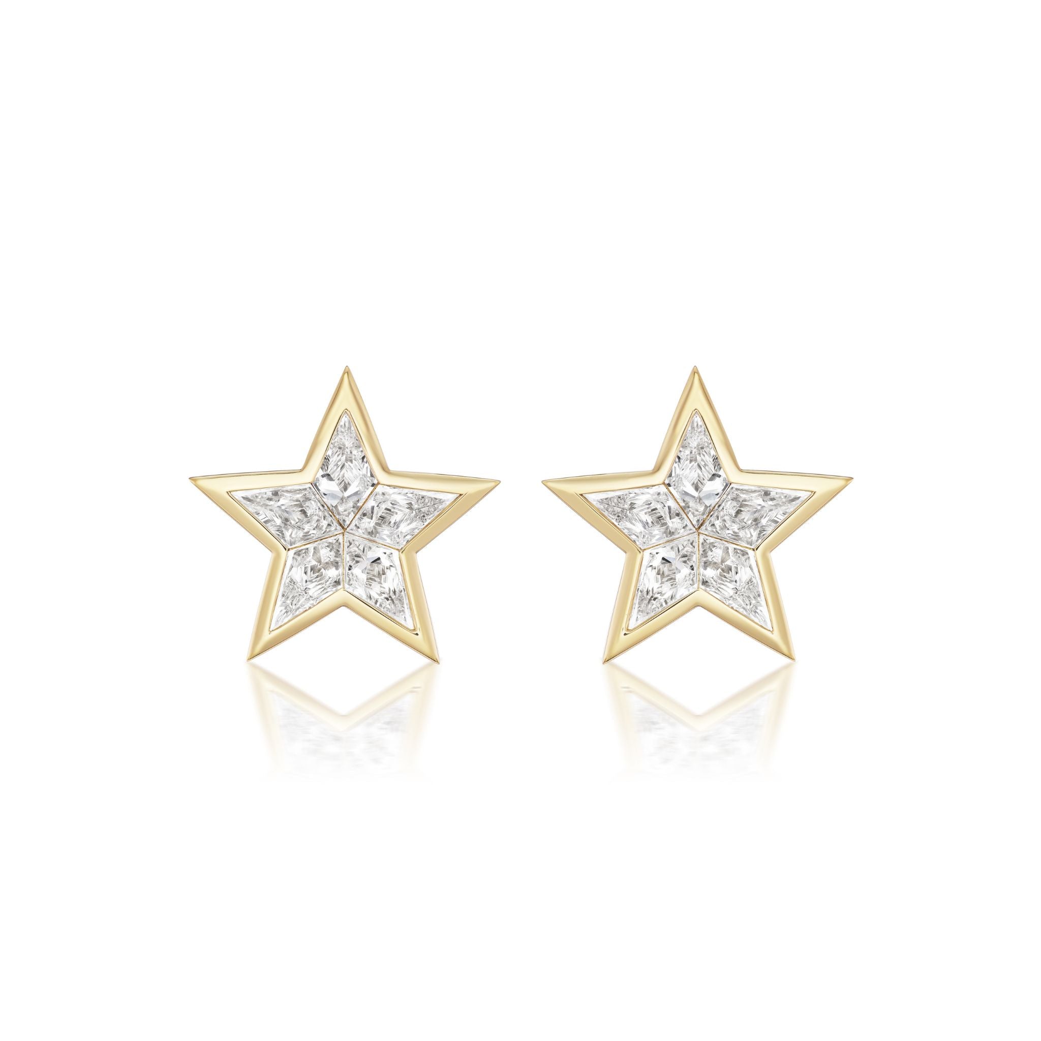 Bezel Set Kite Diamond Star Studs in Yellow Gold feature a pair of elegant star-shaped earrings crafted from luxurious 18k yellow gold, each centered with a clear, sparkling gemstone of SI clarity. Displayed on a white background with a subtle reflection beneath, these studs capture the brilliance and sophistication reminiscent of a classic kite diamond ring.