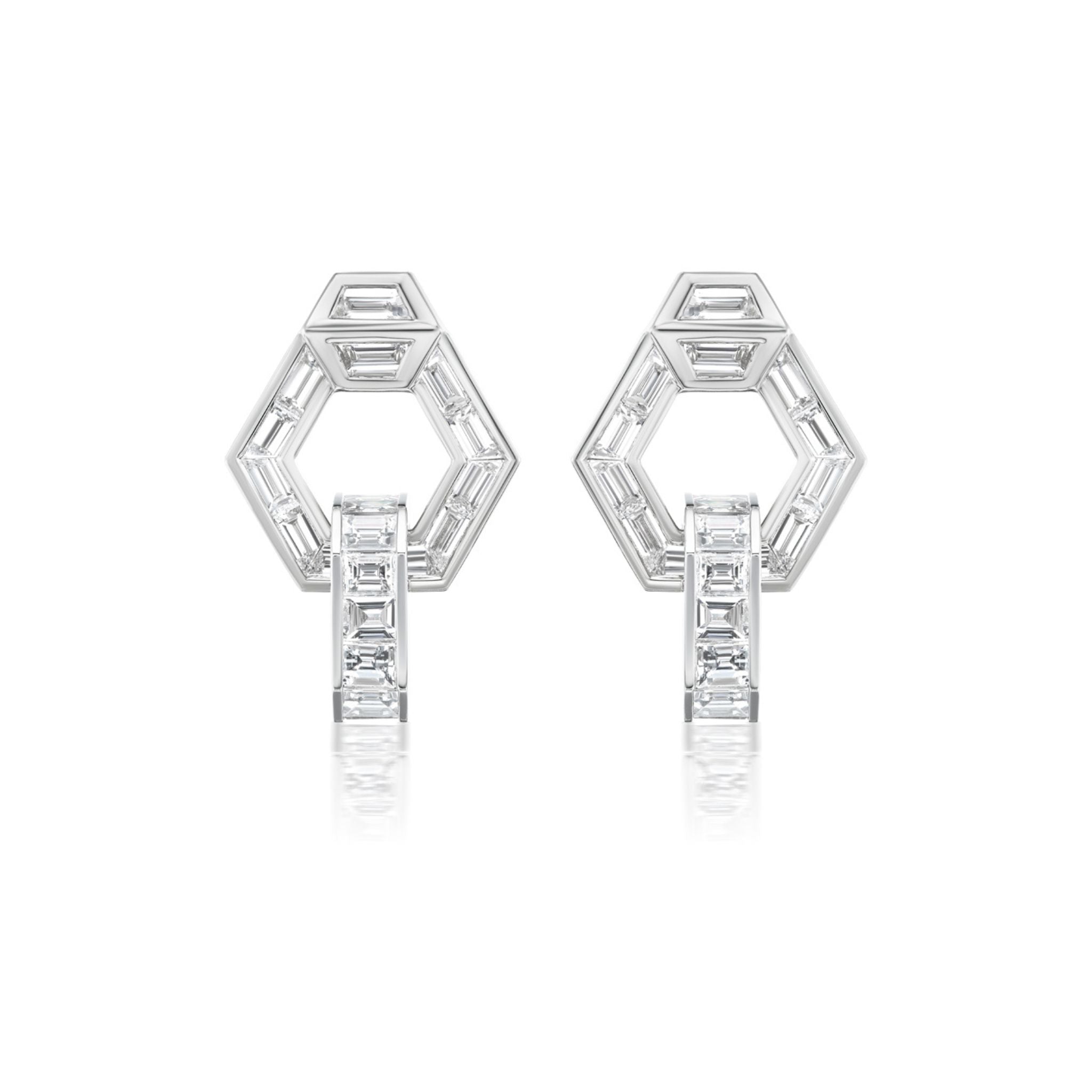 Chrysler Interlocking Hexagon Earrings with Baguette Diamonds, crafted in 18k white gold, featuring clear rectangular baguette diamonds in a modern geometric design. These earrings highlight a bold hexagon silhouette with a vertical diamond-set bar connecting to the lower side, all set against a white background.