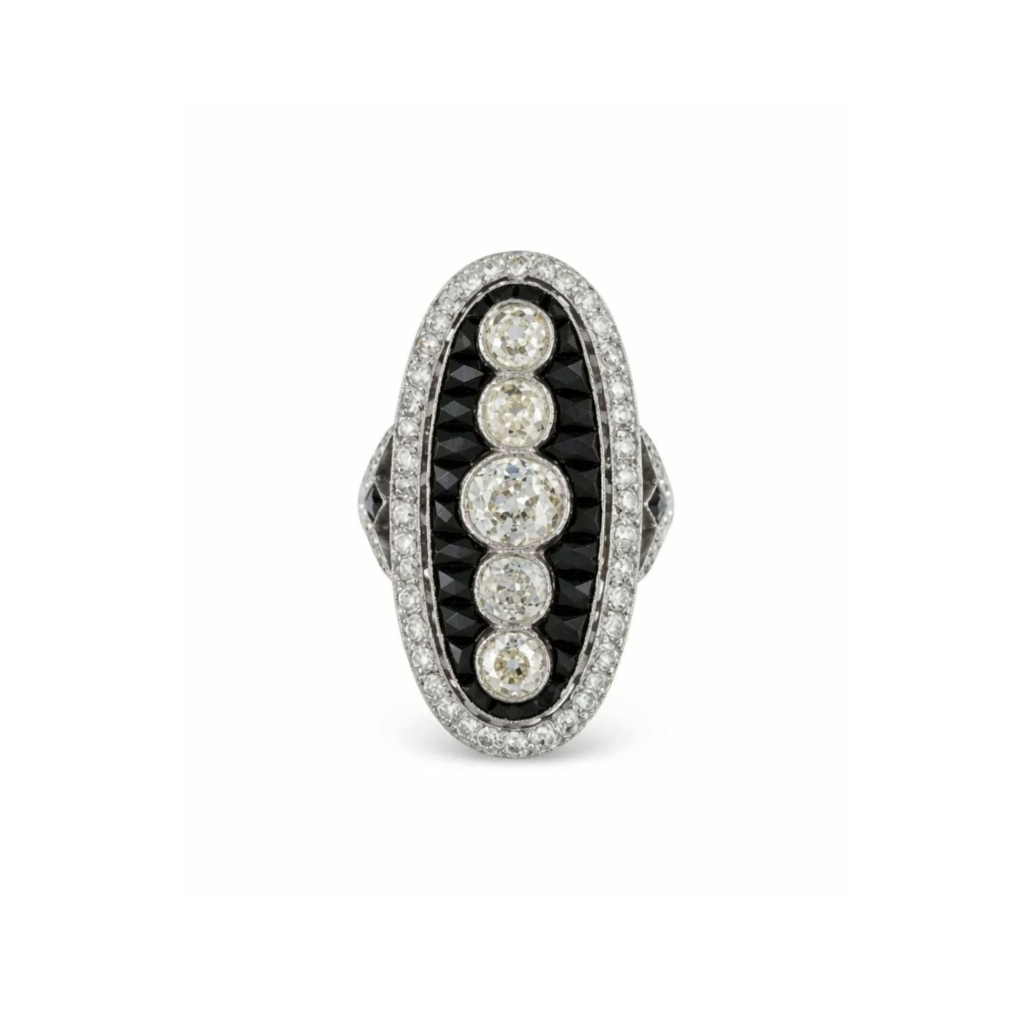 The Onyx and Diamond Ring features an oval-shaped platinum design from the 1930s, showcasing a central row of five old mine-cut diamonds, encircled by calibré-cut onyx and bordered with small white diamonds.