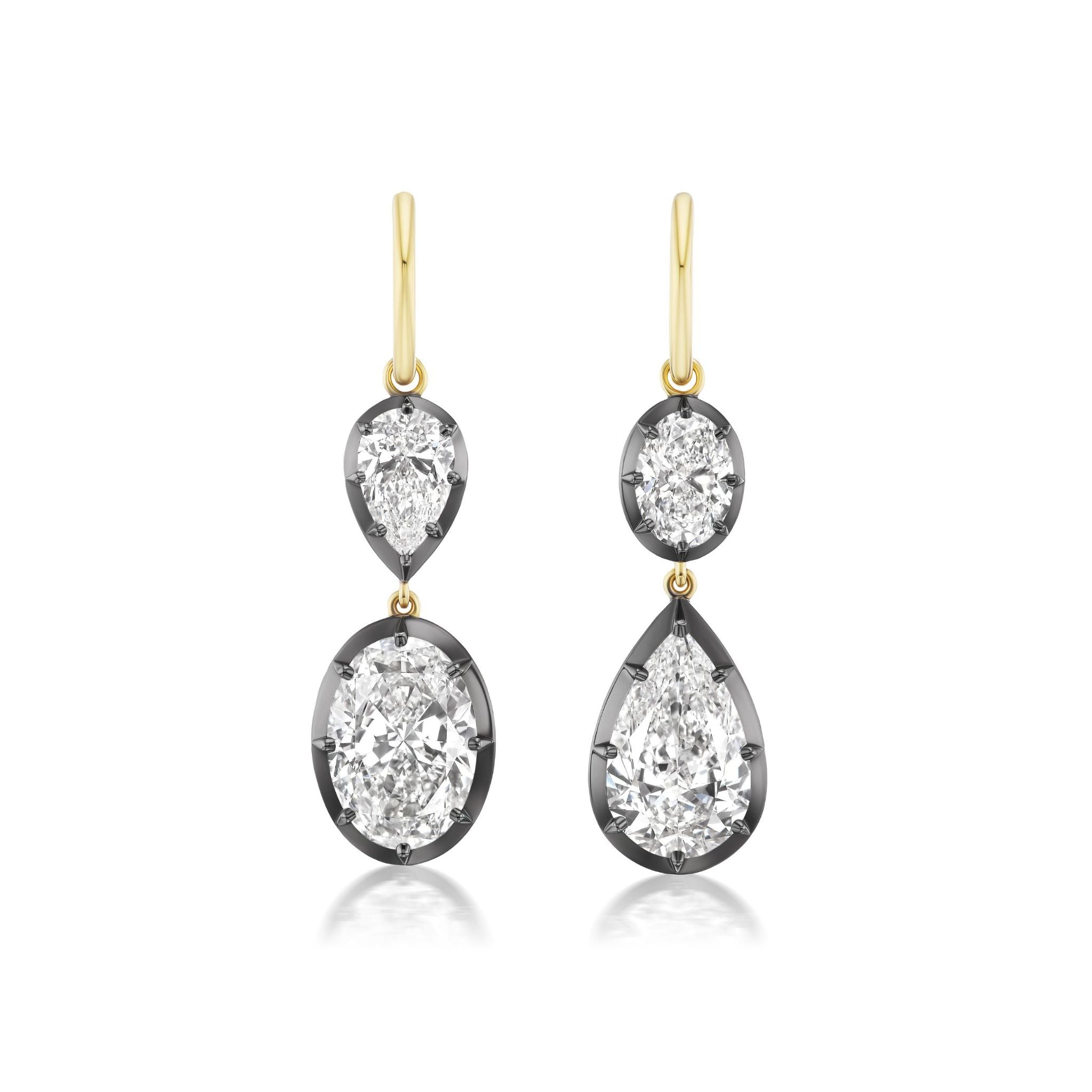 Collet Set Oval and Pear Shape Diamond Drop Earrings crafted with 18k yellow gold hooks, each showcasing two white diamonds—one oval and one pear-shaped—set in black rhodium bezels.