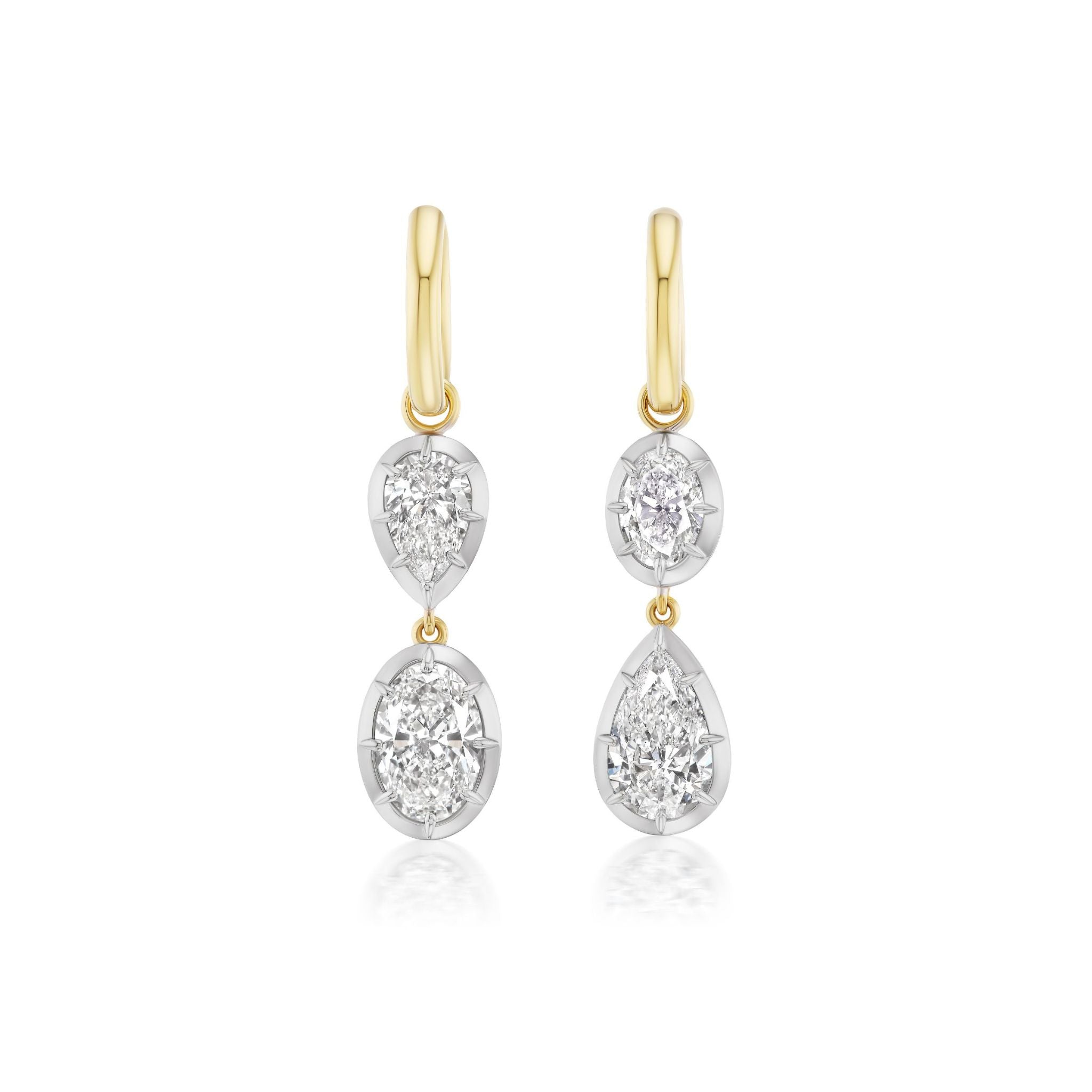 Collet Set Oval Shape and Pear Shape Earrings in White Gold and Yellow Gold, featuring gold hoops adorned with two dangling clear gemstones—one oval-shaped, one teardrop-shaped—reminiscent of oval and pear diamonds, beautifully set in lustrous 18k gold and displayed on a white background.