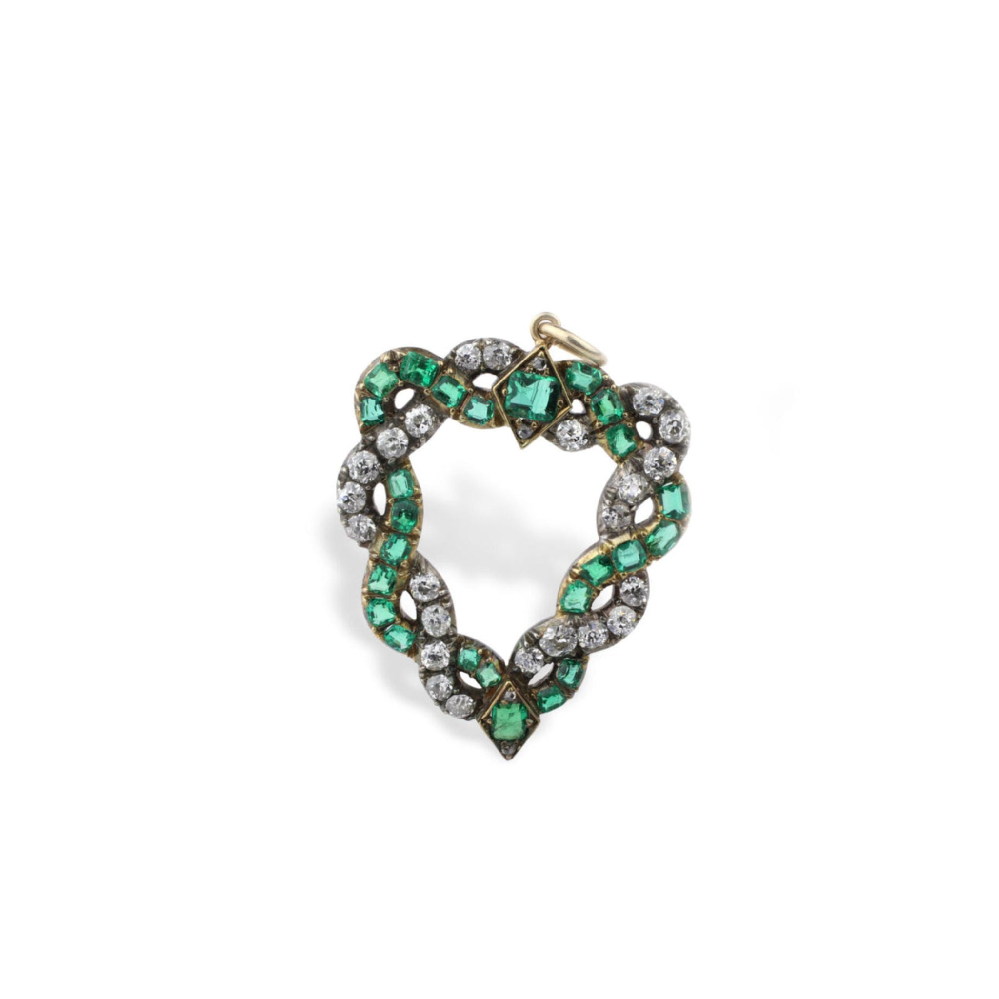Antique Emerald and Diamond Pendant showcasing cushion-shaped emeralds and old-cut diamonds set in a twisted gold design, circa 1890.