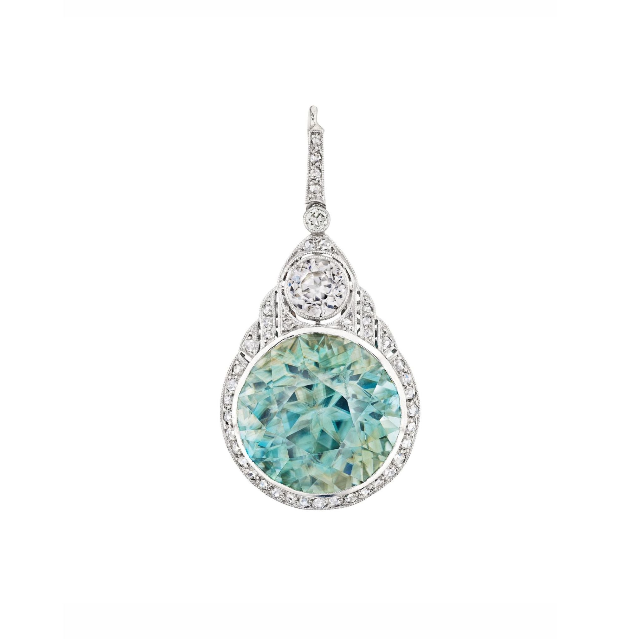 Introducing the Zircon and Diamond Pendant: An elegant piece featuring a large round aqua zircon with a faceted surface, accented by small old-cut diamonds and topped with a smaller round diamond, all set in white metal inspired by 1930s platinum designs.