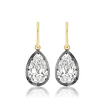 The Collet Set Pear Shape Diamond Drop Earrings, featuring GIA-certified teardrop diamonds in black rhodium-pronged settings with 18k yellow gold hooks, are shown on a white background.