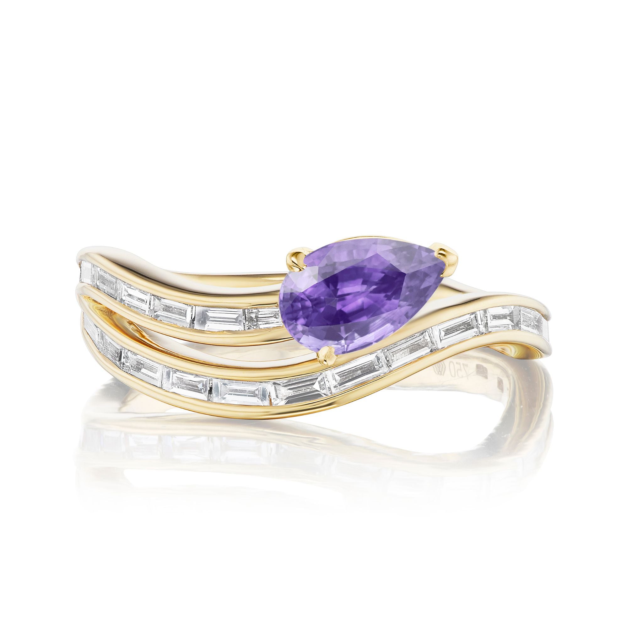 The Wraparound Snake Eternity Band in yellow gold features wavy bands with baguette diamonds and a central pear-shaped purple sapphire.
