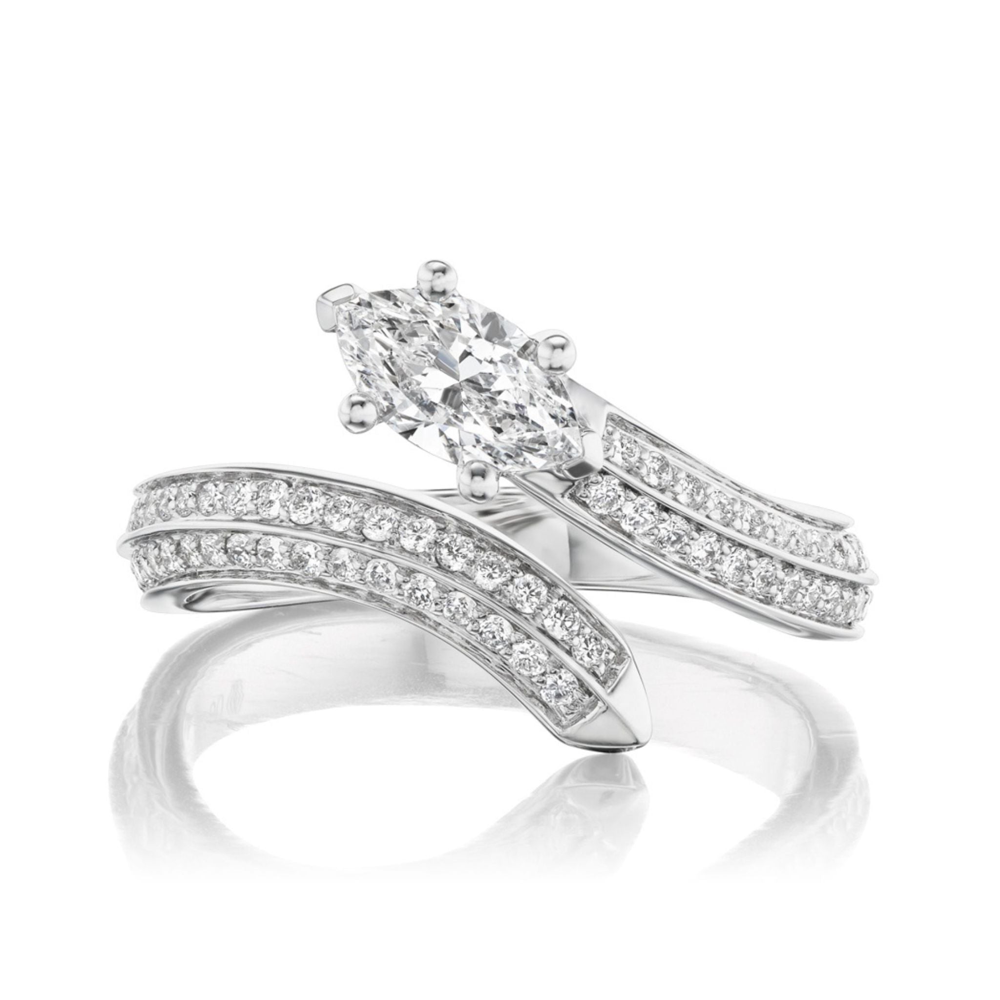The Wraparound Snake Ring in white gold features a marquise diamond at the center and pavé-set round diamonds along the elegant split shank, showcased on a reflective white surface.