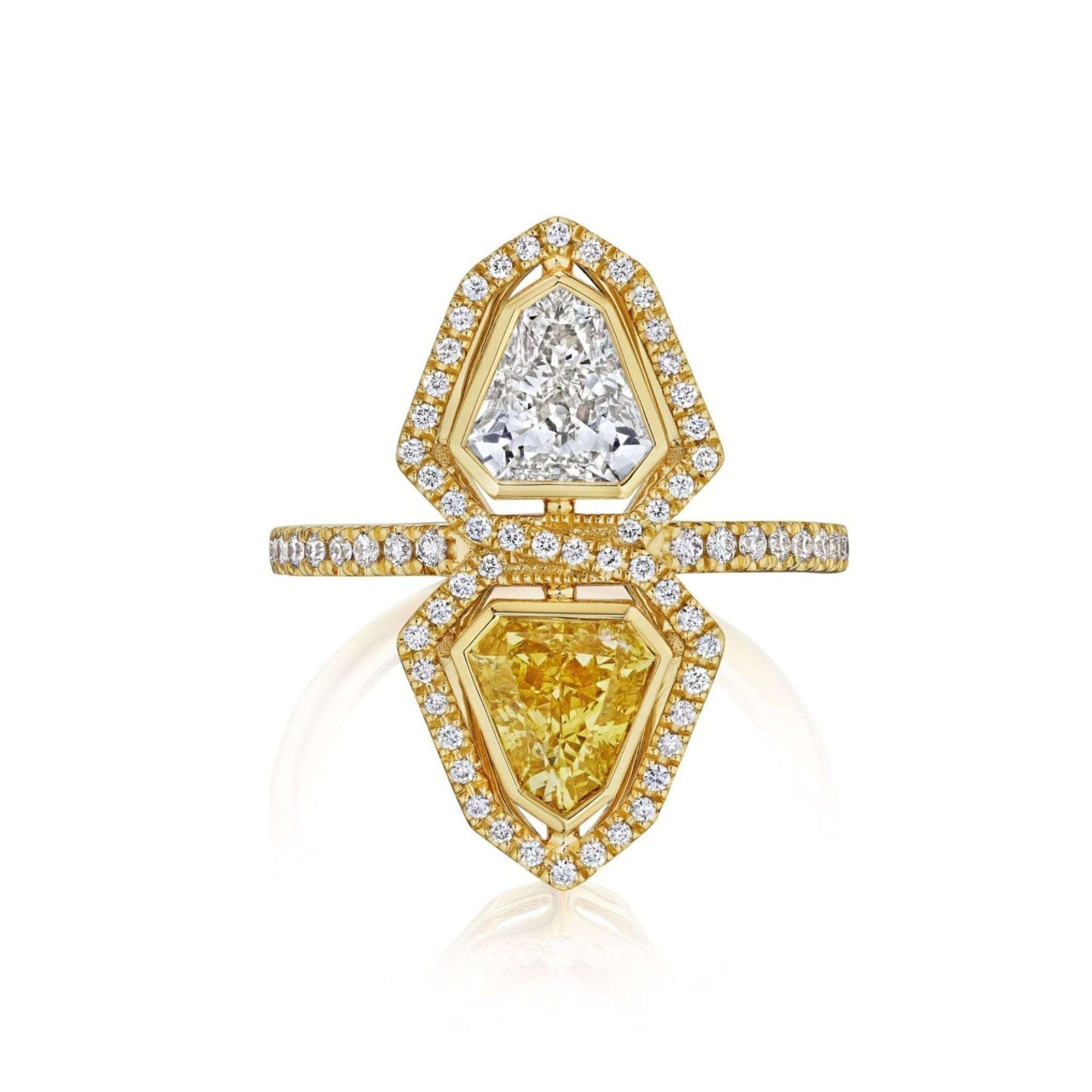 The Yellow Diamond and White Diamond Double Shield Ring with Halo in Yellow Gold features a white diamond and a yellow diamond, each encircled by halos of small white diamonds, with more diamonds set along the gold band.