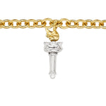 Part of the America250 capsule collection, the America250 Ruby, Pearl, Sapphire, and Diamond Charm Bracelet in Yellow Gold features a pendant inspired by the Statue of Liberty’s torch with gemstone accents.