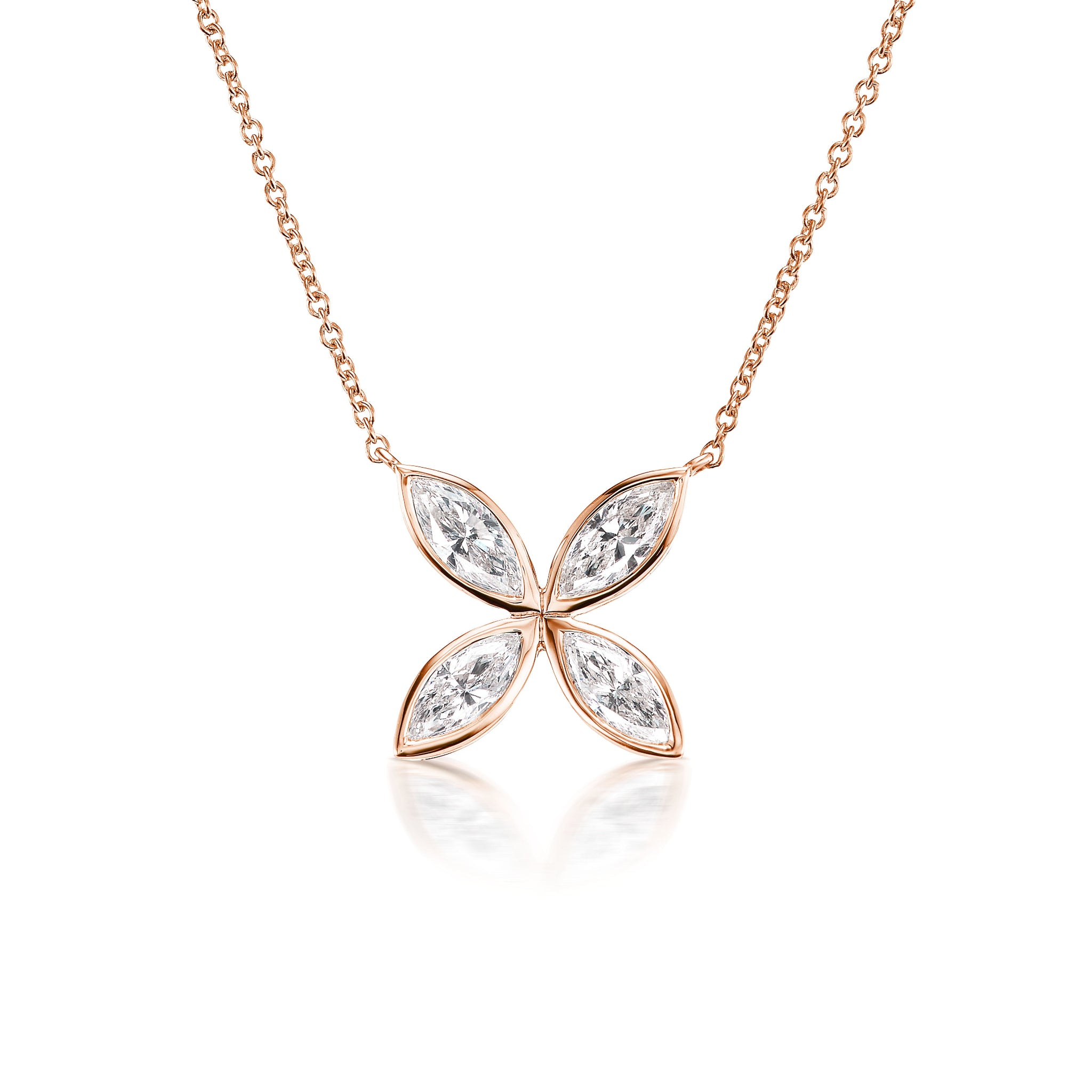 The Bezel Set Marquise Diamond Floral Pendant features a delicate 18k gold chain and a four-petal flower pendant, each petal crafted from a marquise-cut diamond set in gold, displayed against a plain white background.