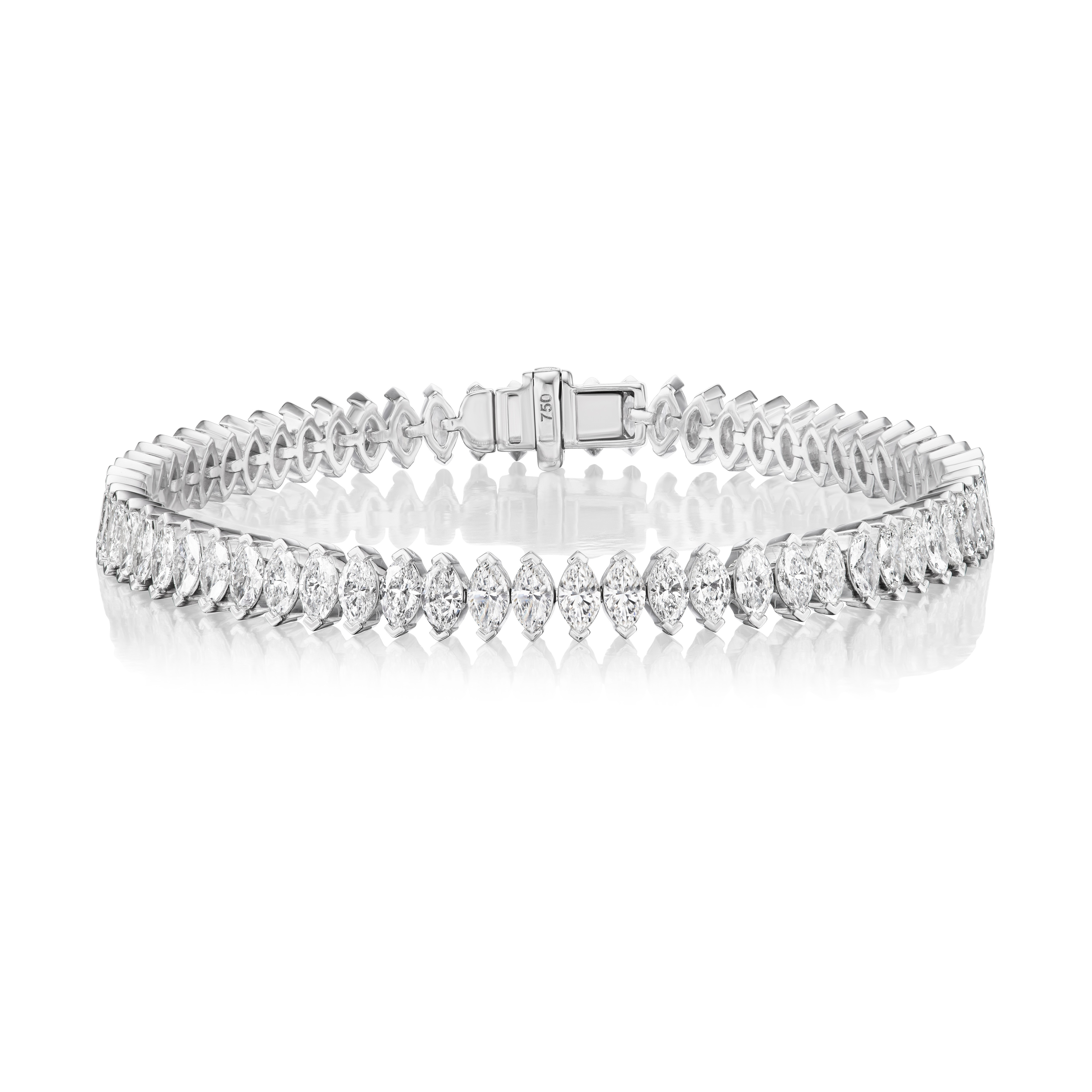 The North-South Set Diamond Marquise Tennis Bracelet in White Gold features a row of round SI clarity diamonds set closely in 18k white gold, shown on a white background.