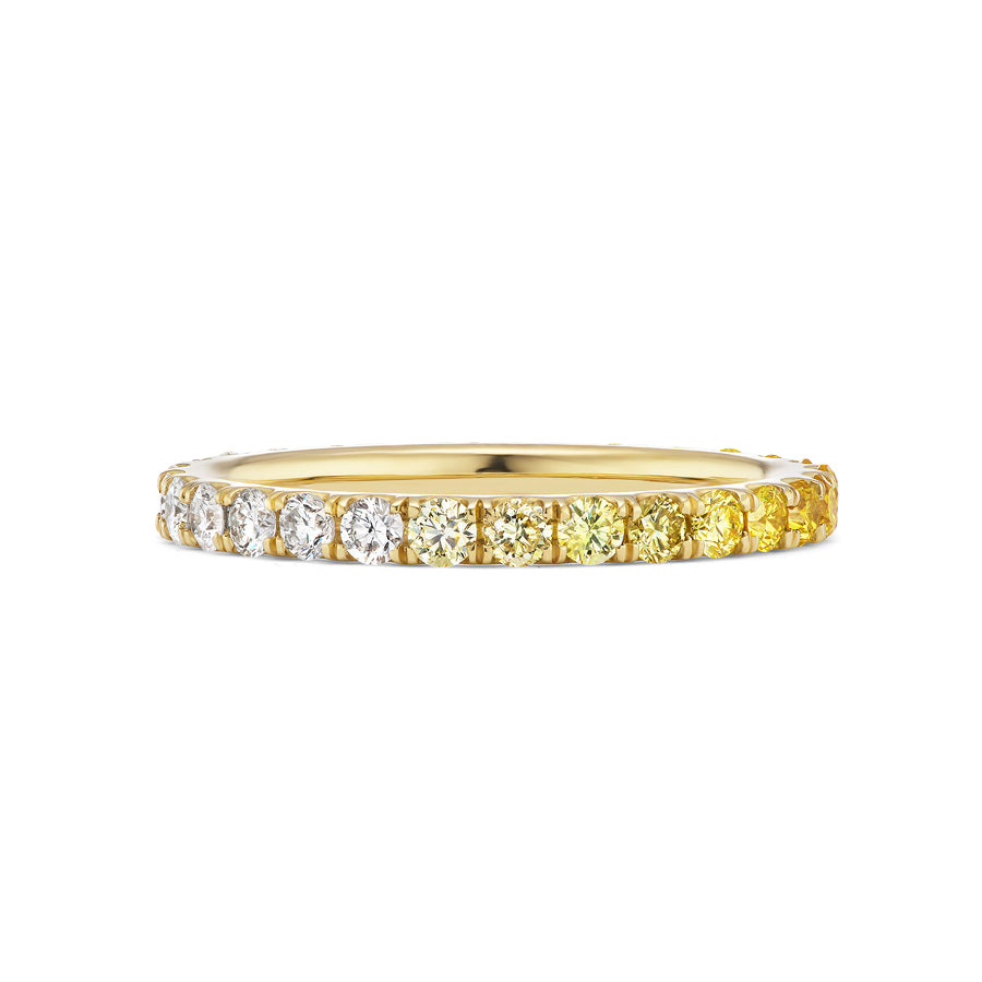 The Ombré Eternity Band features radiant cut yellow sapphires and white diamonds in a gradient, photographed against a white background.